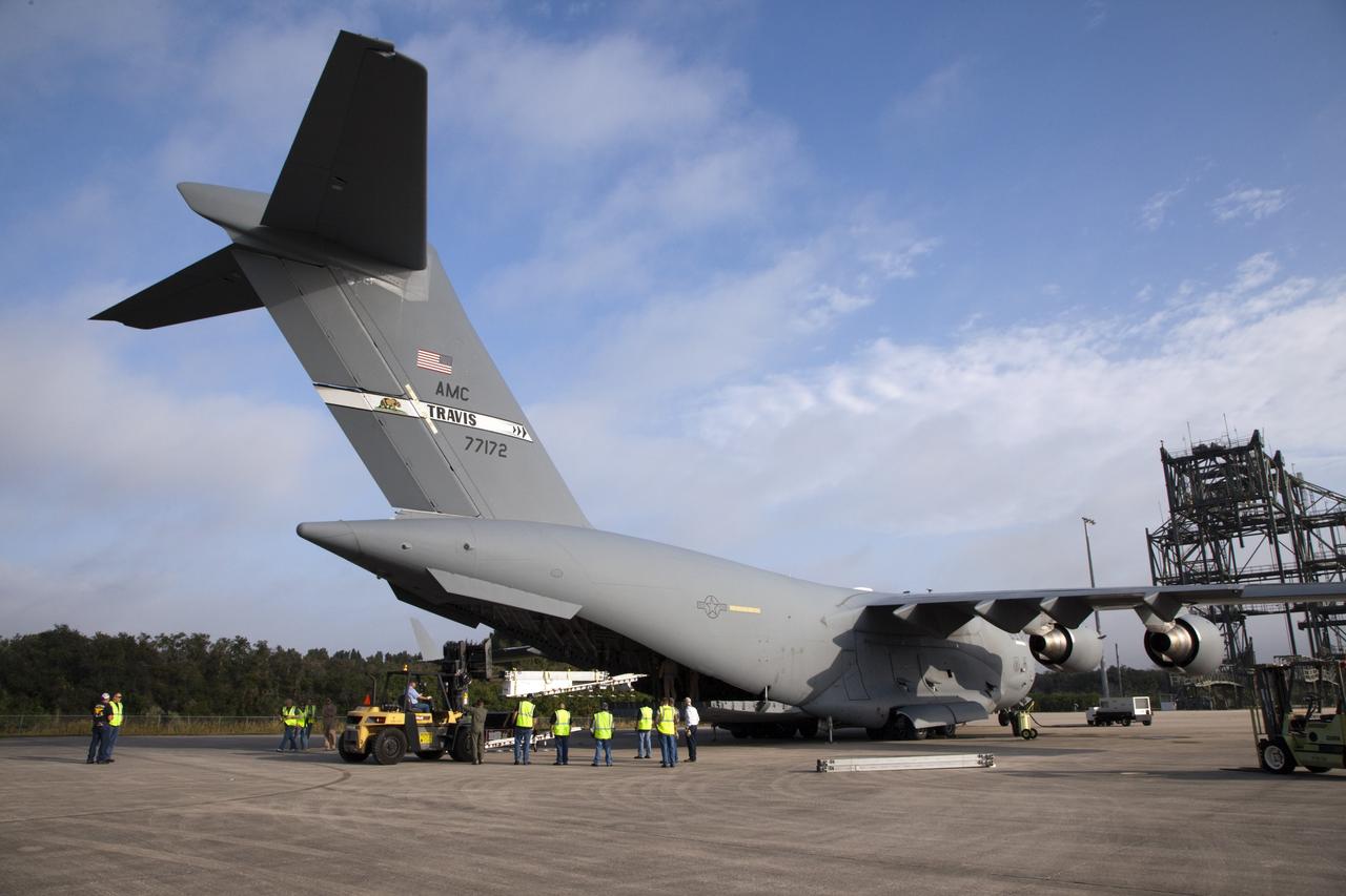 CAPE CANAVERAL, Fla. -- The Tracking and Data Relay Satellite known as TDRS-K arrives at NASA's Kennedy Space Center in Florida aboard an Air Force C-17 transport aircraft at 8:29 a.m. Dec. 18 at the agency's Kennedy Space Center in Florida in preparation for a Jan. 29 launch to a location in geostationary orbit. TDRS-K flew aboard a U.S. Air Force C-17 from the Boeing Space and Intelligence Systems assembly facility in El Segundo, Calif., for final preparation to launch aboard a United Launch Alliance Atlas V rocket. TDRS-K is the first of three next-generation satellites designed to ensure vital operational continuity for NASA by expanding the lifespan of the fleet. Each of the new satellites has a higher performance solar panel design to provide more spacecraft power. This upgrade will return signal processing for the S-Band multiple access service to the ground -- the same as the first-generation TDRS spacecraft. Ground-based processing allows TDRS to service more customers with different and evolving communication requirements. For more information, visit http://tdrs.gsfc.nasa.gov/ Photo credit: NASA/Kim Shiflett