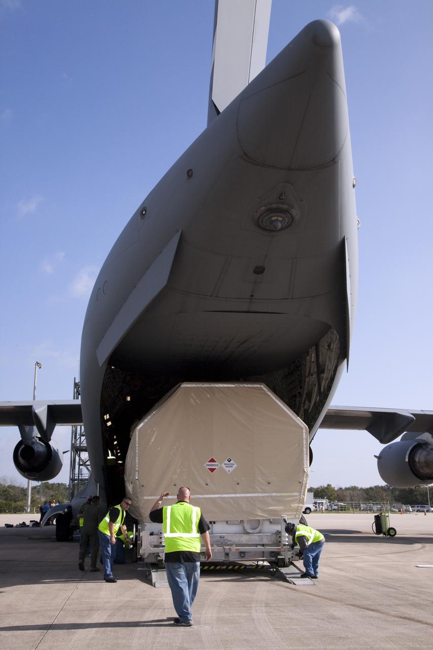 CAPE CANAVERAL, Fla. -- The Tracking and Data Relay Satellite known as TDRS-K arrives at NASA's Kennedy Space Center in Florida aboard an Air Force C-17 transport aircraft at 8:29 a.m. Dec. 18 at the agency's Kennedy Space Center in Florida in preparation for a Jan. 29 launch to a location in geostationary orbit. TDRS-K flew aboard a U.S. Air Force C-17 from the Boeing Space and Intelligence Systems assembly facility in El Segundo, Calif., for final preparation to launch aboard a United Launch Alliance Atlas V rocket. TDRS-K is the first of three next-generation satellites designed to ensure vital operational continuity for NASA by expanding the lifespan of the fleet. Each of the new satellites has a higher performance solar panel design to provide more spacecraft power. This upgrade will return signal processing for the S-Band multiple access service to the ground -- the same as the first-generation TDRS spacecraft. Ground-based processing allows TDRS to service more customers with different and evolving communication requirements. For more information, visit http://tdrs.gsfc.nasa.gov/ Photo credit: NASA/Kim Shiflett