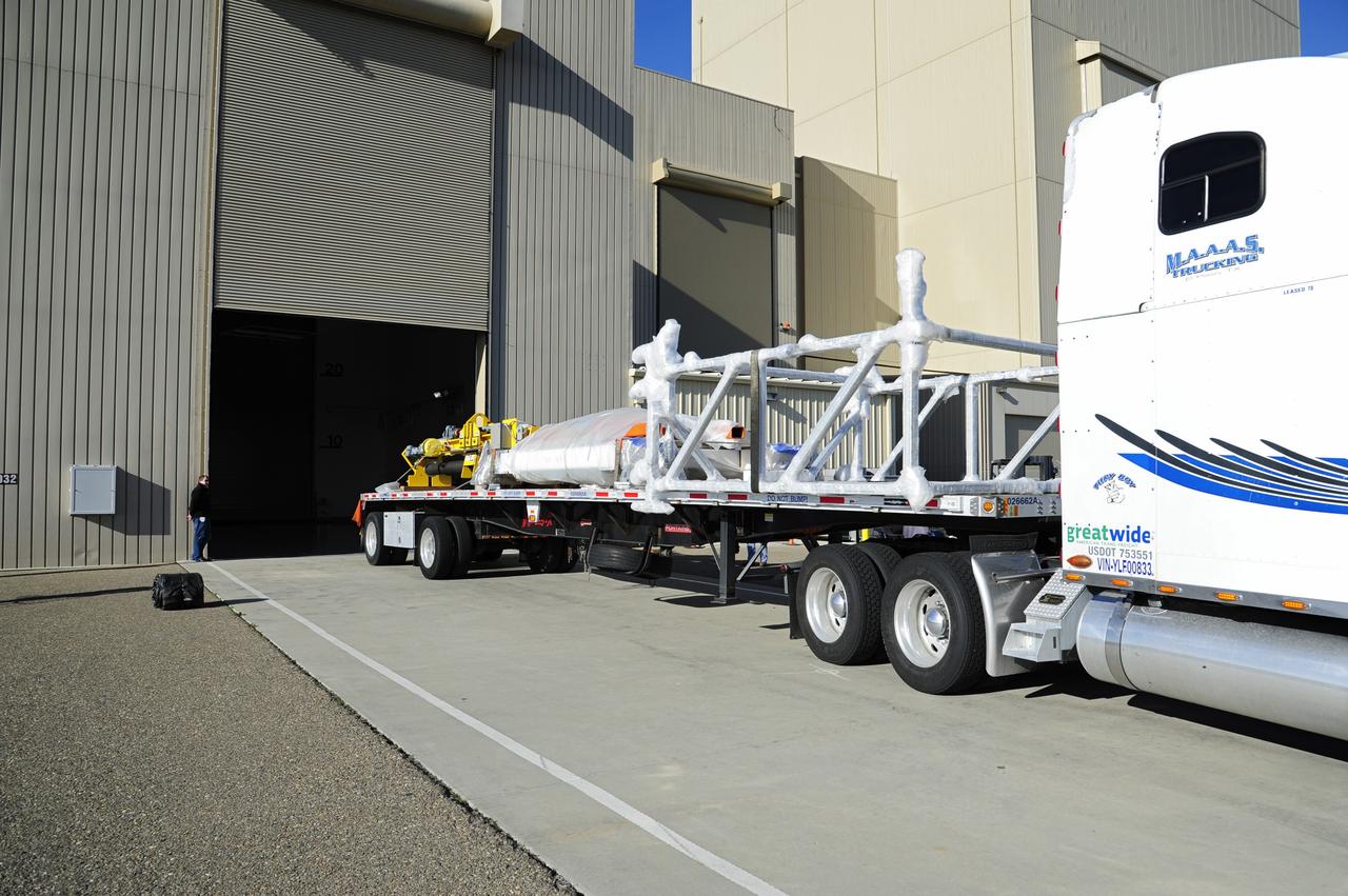 VANDENBERG AFB, Calif.-- Mechanical ground support equipment to be used in support of NASA's Landsat Data Continuity Mission, or LDCM, satellite arrives by transport truck at Vandenberg Air Force Base, Calif.      The Landsat Data Continuity Mission LDCM is the future of Landsat satellites. It will continue to obtain valuable data and imagery to be used in agriculture, education, business, science, and government. The Landsat Program provides repetitive acquisition of high resolution multispectral data of the Earth's surface on a global basis. The data from the Landsat spacecraft constitute the longest record of the Earth's continental surfaces as seen from space. It is a record unmatched in quality, detail, coverage, and value. Launch is planned for Feb. 11, 2013. For more information, visit: http://www.nasa.gov/mission_pages/landsat/main/index.html Photo credit: NASA