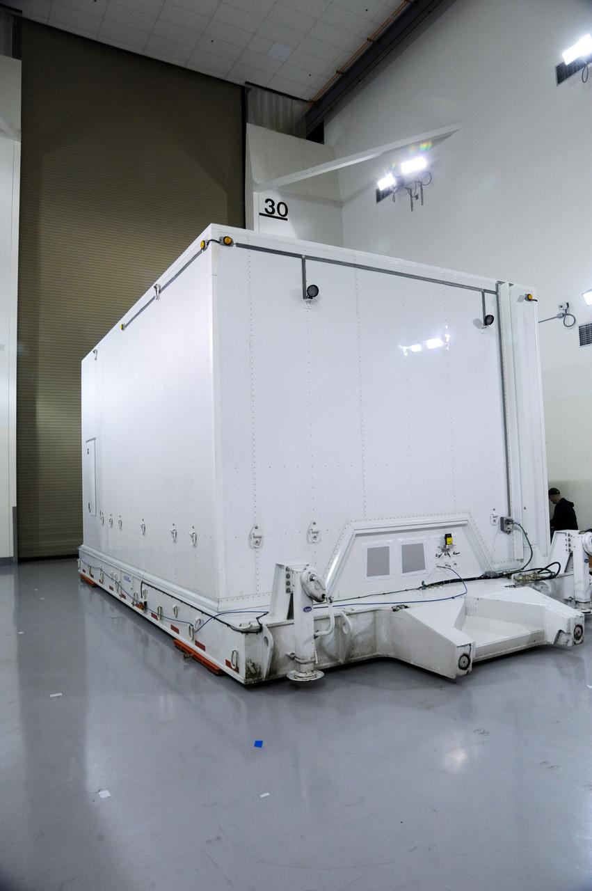 VANDENBERG AFB, Calif.-- The transport container with NASA's Landsat Data Continuity Mission, or LDCM, satellite has been delivered to the prelaunch processing facility at Vandenberg Air Force Base, Calif.      The Landsat Data Continuity Mission LDCM is the future of Landsat satellites. It will continue to obtain valuable data and imagery to be used in agriculture, education, business, science, and government. The Landsat Program provides repetitive acquisition of high resolution multispectral data of the Earth's surface on a global basis. The data from the Landsat spacecraft constitute the longest record of the Earth's continental surfaces as seen from space. It is a record unmatched in quality, detail, coverage, and value. Launch is planned for Feb. 11, 2013. For more information, visit: http://www.nasa.gov/mission_pages/landsat/main/index.html Photo credit: NASA