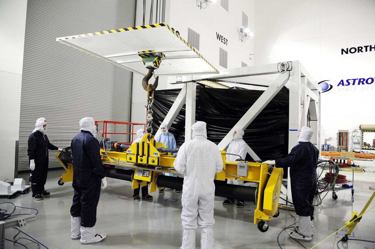 VANDENBERG AFB, Calif. -- Technicians unload NASA's Landsat Data Continuity Mission, or LDCM, satellite at the Astrotech processing facility at Vandenberg Air Force Base, Calif.      The Landsat Data Continuity Mission LDCM is the future of Landsat satellites. It will continue to obtain valuable data and imagery to be used in agriculture, education, business, science, and government. The Landsat Program provides repetitive acquisition of high resolution multispectral data of the Earth's surface on a global basis. The data from the Landsat spacecraft constitute the longest record of the Earth's continental surfaces as seen from space. It is a record unmatched in quality, detail, coverage, and value. Launch is planned for Feb. 11, 2013. For more information, visit: http://www.nasa.gov/mission_pages/landsat/main/index.html Photo credit: NASA