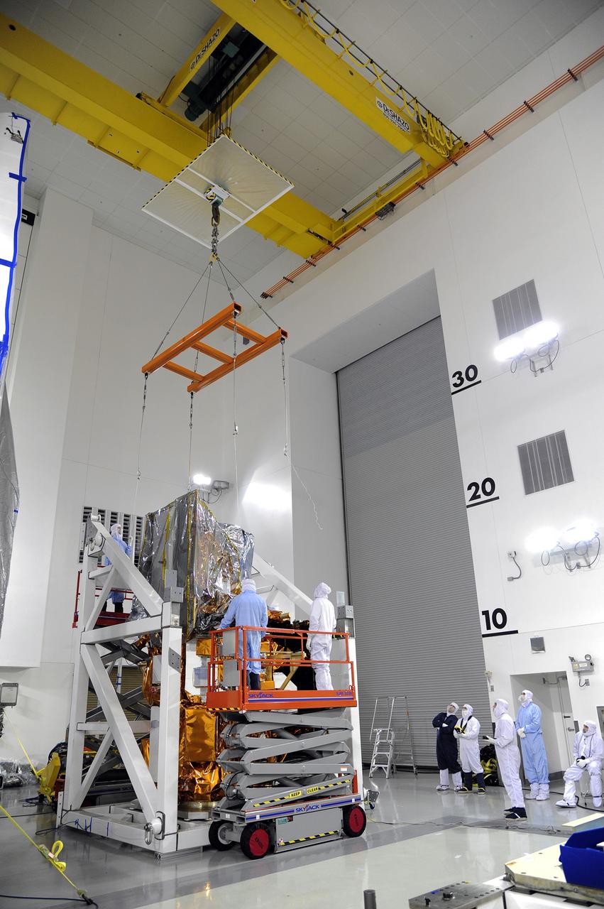 VANDENBERG AFB, Calif. -- Technicians unload NASA's Landsat Data Continuity Mission, or LDCM, satellite at the Astrotech processing facility at Vandenberg Air Force Base, Calif.      The Landsat Data Continuity Mission LDCM is the future of Landsat satellites. It will continue to obtain valuable data and imagery to be used in agriculture, education, business, science, and government. The Landsat Program provides repetitive acquisition of high resolution multispectral data of the Earth's surface on a global basis. The data from the Landsat spacecraft constitute the longest record of the Earth's continental surfaces as seen from space. It is a record unmatched in quality, detail, coverage, and value. Launch is planned for Feb. 11, 2013. For more information, visit: http://www.nasa.gov/mission_pages/landsat/main/index.html Photo credit: NASA