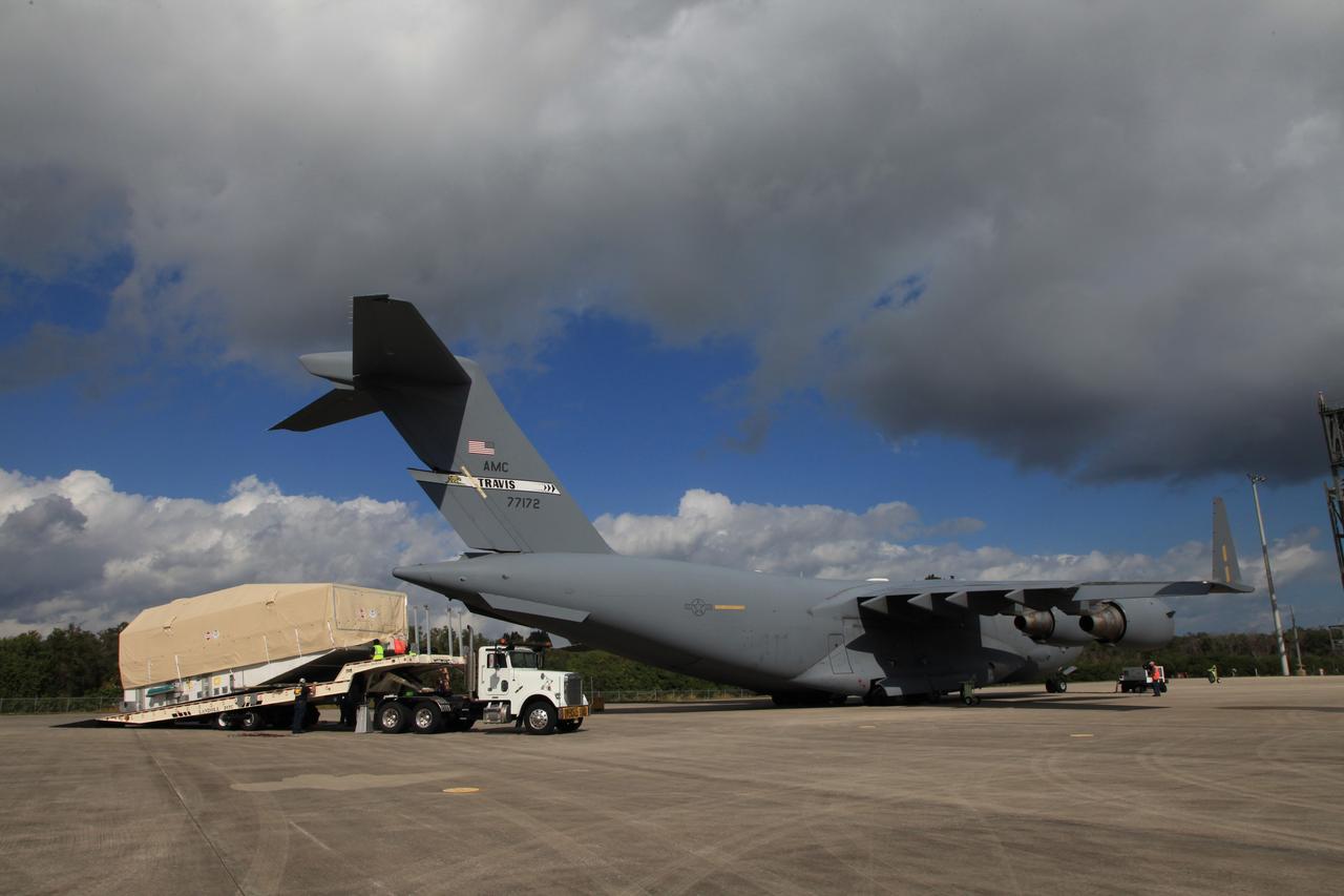 CAPE CANAVERAL, Fla. - The Tracking and Data Relay Satellite, TDRS-K, is off-loaded from a military transport aircraft after its arrival at the Shuttle Landing Facility at NASA's Kennedy Space Center in Florida.      Launch of the TDRS-K on the Atlas V rocket is planned for January 29, 2013. The TDRS-K spacecraft is part of the next-generation series in the Tracking and Data Relay Satellite System, a constellation of space-based communication satellites providing tracking, telemetry, command and high-bandwidth data return services. For more information, visit http://www.nasa.gov/mission_pages/tdrs/index.html Photo credit: NASA/Kim Shiflett