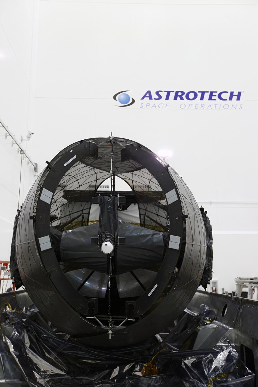 TITUSVILLE, Fla. - Inside the Astrotech payload processing facility in Titusville, Fla. near NASA’s Kennedy Space Center, the Tracking and Data Relay Satellite, TDRS-K, is being checked out prior to being encapsulated in the nose faring.      Launch of the TDRS-K on the Atlas V rocket is planned for January 29, 2013. The TDRS-K spacecraft is part of the next-generation series in the Tracking and Data Relay Satellite System, a constellation of space-based communication satellites providing tracking, telemetry, command and high-bandwidth data return services. For more information, visit http://www.nasa.gov/mission_pages/tdrs/index.html Photo credit: NASA/Kim Shiflett