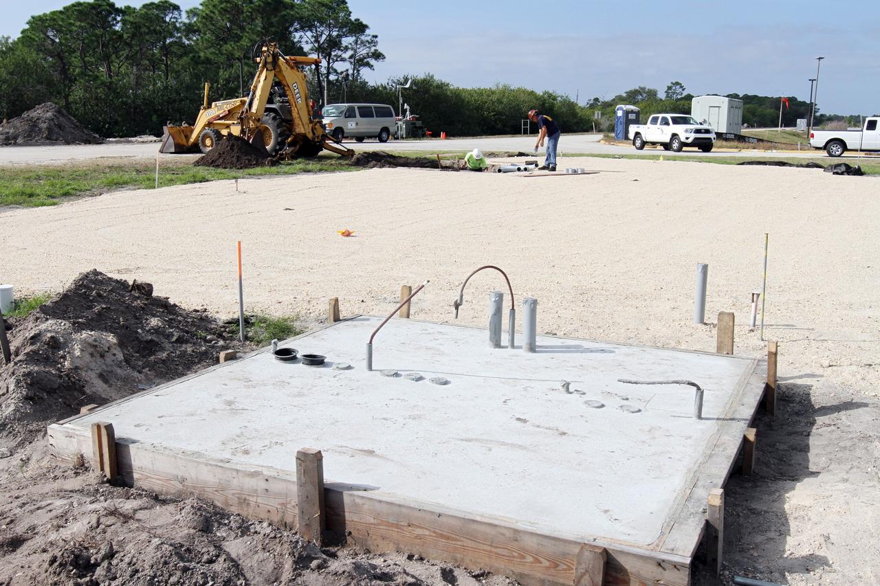 CAPE CANAVERAL, Fla. – At NASA’s Kennedy Space Center in Florida, workers continue construction of the Antenna Test Bed Array for the Ka-Band Objects Observation and Monitoring, or Ka-BOOM, system. The construction site is near the former Vertical Processing Facility, which has been demolished. Workers soon will begin construction on the 40-foot-diameter dish antenna arrays and their associated utilities, and prepare the site for the operations command center facility. The Ka-BOOM project is one of the final steps in developing the techniques to build a high power, high resolution radar system capable of becoming a Near Earth Object Early Warning System. While also capable of space communication and radio science experiments, developing radar applications is the primary focus of the arrays. Photo credit: NASA/ Ben Smegelsky
