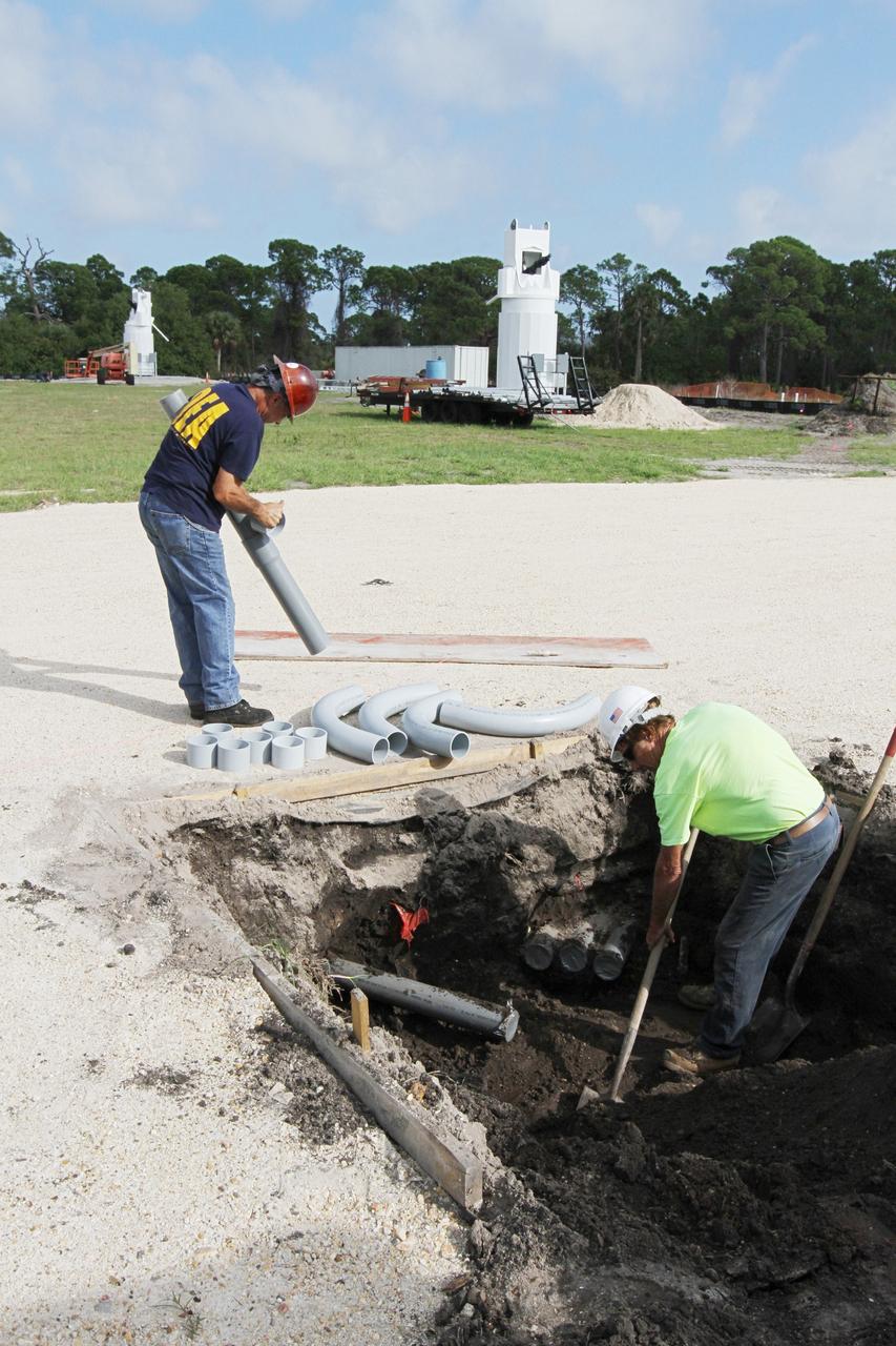 CAPE CANAVERAL, Fla. – At NASA’s Kennedy Space Center in Florida, workers continue construction of the Antenna Test Bed Array for the Ka-Band Objects Observation and Monitoring, or Ka-BOOM, system. The construction site is near the former Vertical Processing Facility, which has been demolished. Workers soon will begin construction on the 40-foot-diameter dish antenna arrays and their associated utilities, and prepare the site for the operations command center facility. The Ka-BOOM project is one of the final steps in developing the techniques to build a high power, high resolution radar system capable of becoming a Near Earth Object Early Warning System. While also capable of space communication and radio science experiments, developing radar applications is the primary focus of the arrays. Photo credit: NASA/ Ben Smegelsky