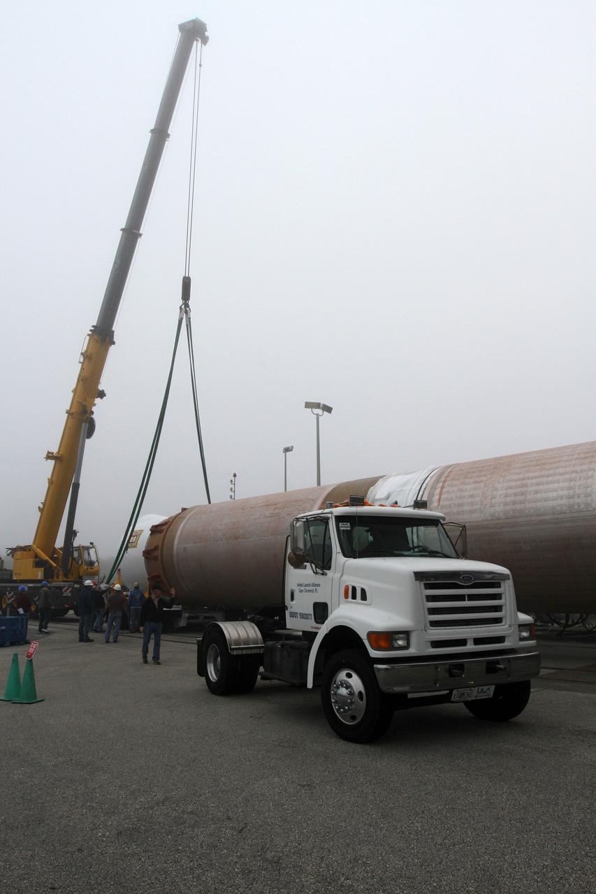 CAPE CANAVERAL, Fla. -- In the morning fog at Cape Canaveral Air Force Station's Space Launch Complex 41 in Florida, preparations are underway to erect the first stage of the Atlas V rocket that will carry the Tracking and Data Relay Satellite, TDRS-K, into orbit.      Launch of the TDRS-K on the Atlas V rocket is planned for January 29, 2013. The TDRS-K spacecraft is part of the next-generation series in the Tracking and Data Relay Satellite System, a constellation of space-based communication satellites providing tracking, telemetry, command and high-bandwidth data return services. For more information, visit http://www.nasa.gov/mission_pages/tdrs/index.html Photo credit: NASA/ Ben Smegelsky