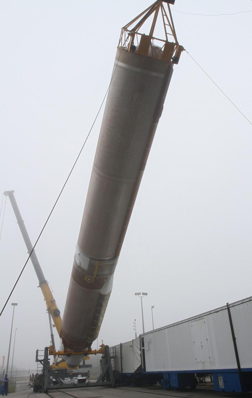 CAPE CANAVERAL, Fla. -- At Cape Canaveral Air Force Station's Space Launch Complex 41 in Florida, operations are underway to erect the first stage of the Atlas V rocket that will carry the Tracking and Data Relay Satellite, TDRS-K, into orbit.      Launch of the TDRS-K on the Atlas V rocket is planned for January 29, 2013. The TDRS-K spacecraft is part of the next-generation series in the Tracking and Data Relay Satellite System, a constellation of space-based communication satellites providing tracking, telemetry, command and high-bandwidth data return services. For more information, visit http://www.nasa.gov/mission_pages/tdrs/index.html Photo credit: NASA/ Ben Smegelsky