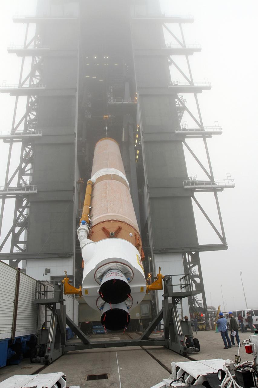 CAPE CANAVERAL, Fla. -- At Cape Canaveral Air Force Station's Space Launch Complex 41 in Florida, operations are underway to erect the first stage of the Atlas V rocket that will carry the Tracking and Data Relay Satellite, TDRS-K, into orbit.      Launch of the TDRS-K on the Atlas V rocket is planned for January 29, 2013. The TDRS-K spacecraft is part of the next-generation series in the Tracking and Data Relay Satellite System, a constellation of space-based communication satellites providing tracking, telemetry, command and high-bandwidth data return services. For more information, visit http://www.nasa.gov/mission_pages/tdrs/index.html Photo credit: NASA/ Ben Smegelsky