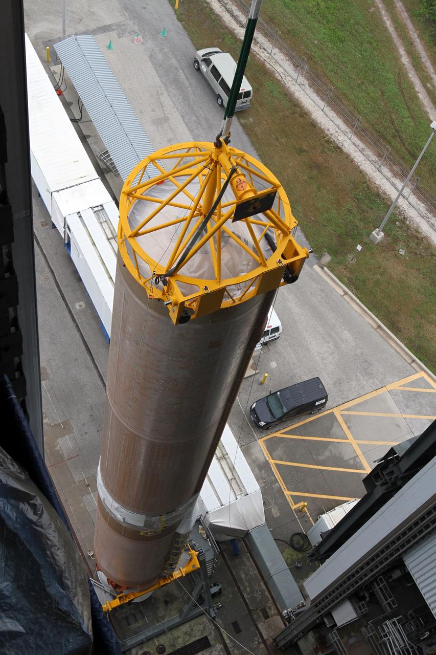 CAPE CANAVERAL, Fla. -- At Cape Canaveral Air Force Station's Space Launch Complex 41 in Florida, operations are underway to erect the first stage of the Atlas V rocket that will carry the Tracking and Data Relay Satellite, TDRS-K, into orbit.      Launch of the TDRS-K on the Atlas V rocket is planned for January 29, 2013. The TDRS-K spacecraft is part of the next-generation series in the Tracking and Data Relay Satellite System, a constellation of space-based communication satellites providing tracking, telemetry, command and high-bandwidth data return services. For more information, visit http://www.nasa.gov/mission_pages/tdrs/index.html Photo credit: NASA/ Ben Smegelsky