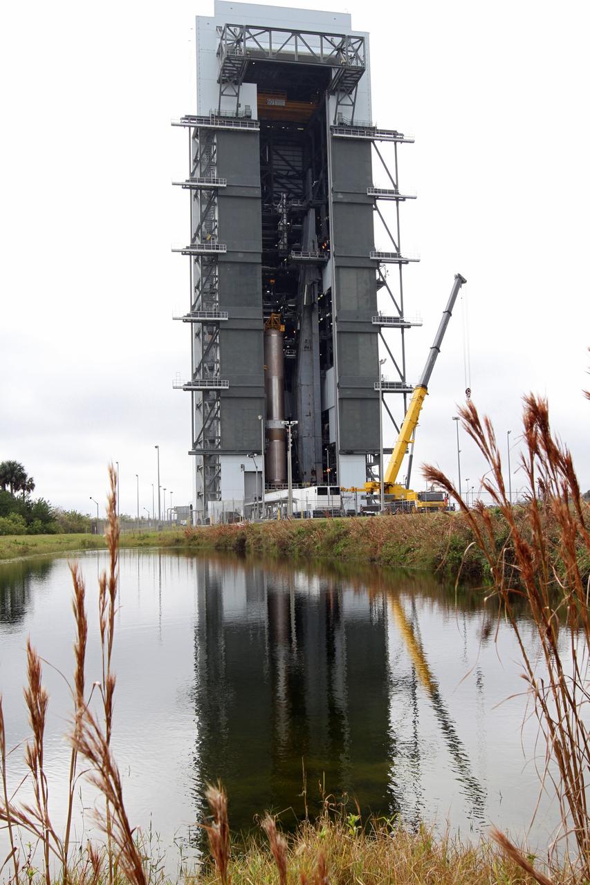 CAPE CANAVERAL, Fla. -- The first stage of the Atlas V rocket that will carry the Tracking and Data Relay Satellite, TDRS-K, into orbit has been erected at Cape Canaveral Air Force Station's Space Launch Complex 41 in Florida.      Launch of the TDRS-K on the Atlas V rocket is planned for January 29, 2013. The TDRS-K spacecraft is part of the next-generation series in the Tracking and Data Relay Satellite System, a constellation of space-based communication satellites providing tracking, telemetry, command and high-bandwidth data return services. For more information, visit http://www.nasa.gov/mission_pages/tdrs/index.html Photo credit: NASA/ Ben Smegelsky