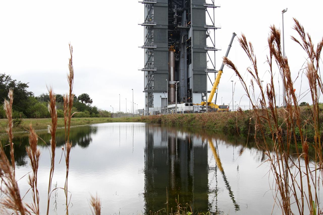 CAPE CANAVERAL, Fla. -- The first stage of the Atlas V rocket that will carry the Tracking and Data Relay Satellite, TDRS-K, into orbit has been erected at Cape Canaveral Air Force Station's Space Launch Complex 41 in Florida.      Launch of the TDRS-K on the Atlas V rocket is planned for January 29, 2013. The TDRS-K spacecraft is part of the next-generation series in the Tracking and Data Relay Satellite System, a constellation of space-based communication satellites providing tracking, telemetry, command and high-bandwidth data return services. For more information, visit http://www.nasa.gov/mission_pages/tdrs/index.html Photo credit: NASA/ Ben Smegelsky