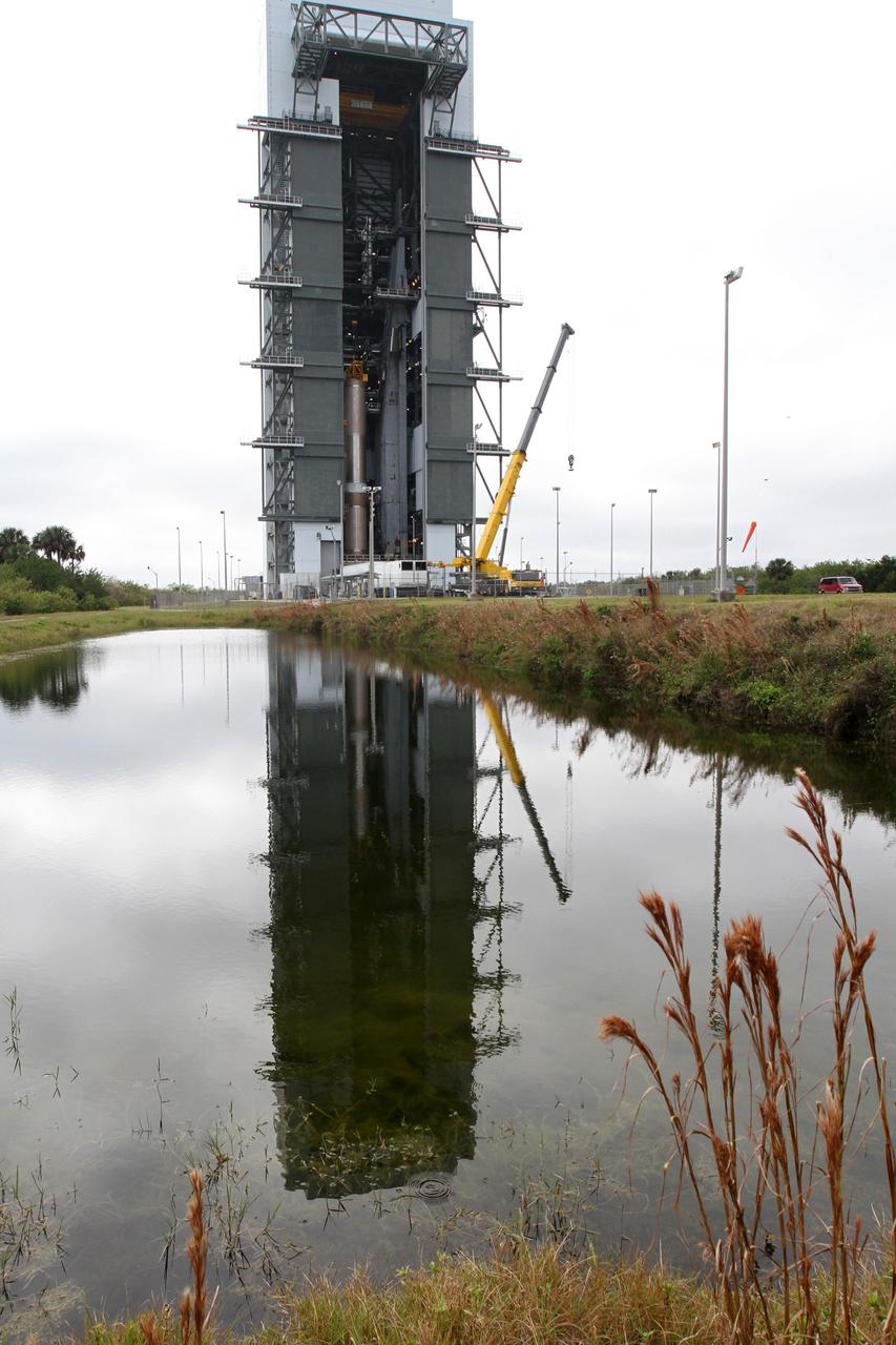 CAPE CANAVERAL, Fla. -- The first stage of the Atlas V rocket that will carry the Tracking and Data Relay Satellite, TDRS-K, into orbit has been erected at Cape Canaveral Air Force Station's Space Launch Complex 41 in Florida.      Launch of the TDRS-K on the Atlas V rocket is planned for January 29, 2013. The TDRS-K spacecraft is part of the next-generation series in the Tracking and Data Relay Satellite System, a constellation of space-based communication satellites providing tracking, telemetry, command and high-bandwidth data return services. For more information, visit http://www.nasa.gov/mission_pages/tdrs/index.html Photo credit: NASA/ Ben Smegelsky
