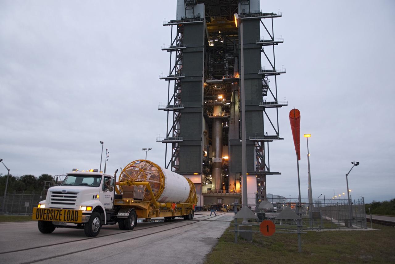CAPE CANAVERAL, Fla. -- The Centaur stage which will help boost the Tracking and Data Relay Satellite, TDRS-K, into orbit arrives by transport truck at Cape Canaveral Air Force Station's Space Launch Complex 41 in Florida for mating to an Atlas V rocket.      Launch of the TDRS-K on the Atlas V rocket is planned for January 29, 2013. The TDRS-K spacecraft is part of the next-generation series in the Tracking and Data Relay Satellite System, a constellation of space-based communication satellites providing tracking, telemetry, command and high-bandwidth data return services. For more information, visit http://www.nasa.gov/mission_pages/tdrs/index.html Photo credit: NASA/Charisse Nahser