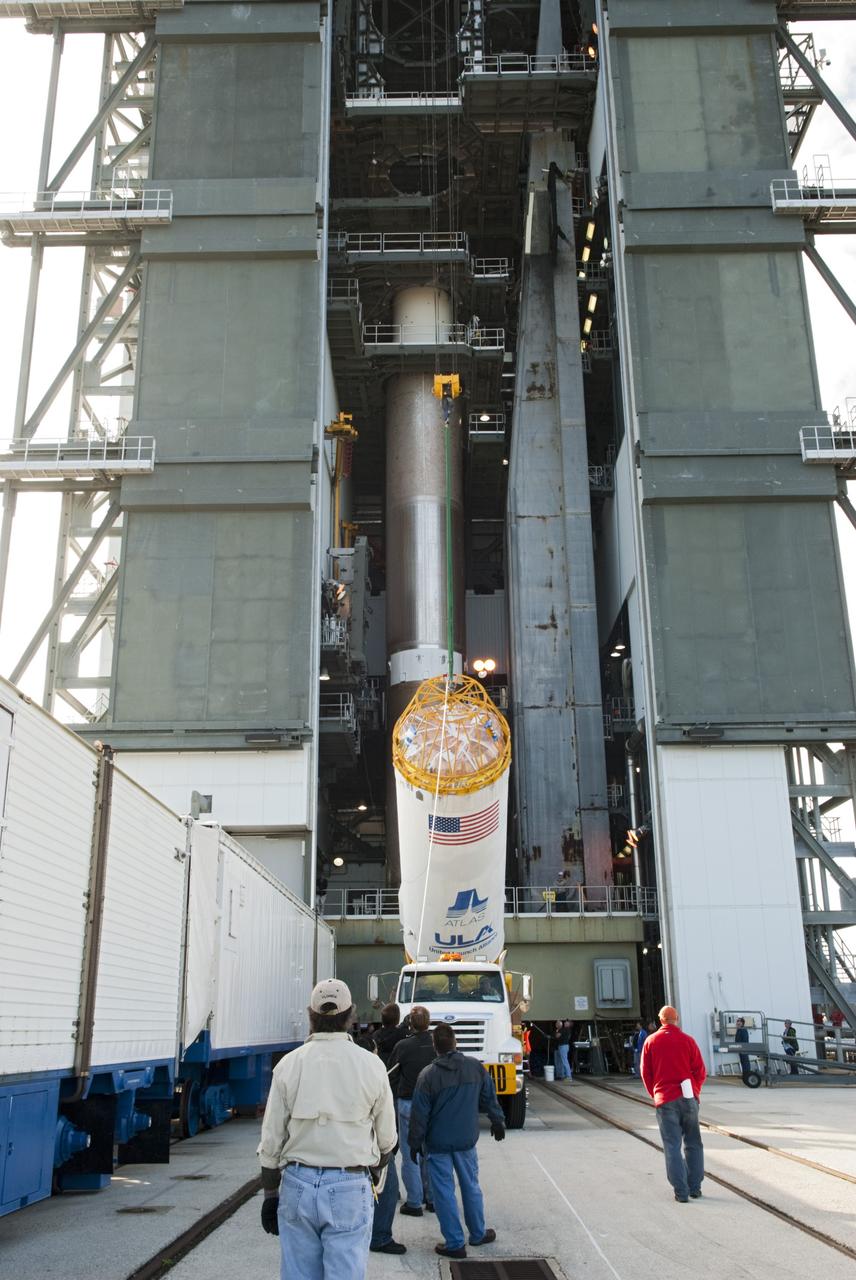 CAPE CANAVERAL, Fla. -- At Cape Canaveral Air Force Station's Space Launch Complex 41 in Florida, United Launch Alliance technicians support operations to lift the Centaur stage for mating to the Atlas V rocket that will carry the Tracking and Data Relay Satellite, TDRS-K, into orbit.      Launch of the TDRS-K on the Atlas V rocket is planned for January 29, 2013. The TDRS-K spacecraft is part of the next-generation series in the Tracking and Data Relay Satellite System, a constellation of space-based communication satellites providing tracking, telemetry, command and high-bandwidth data return services. For more information, visit http://www.nasa.gov/mission_pages/tdrs/index.html Photo credit: NASA/Charisse Nahser