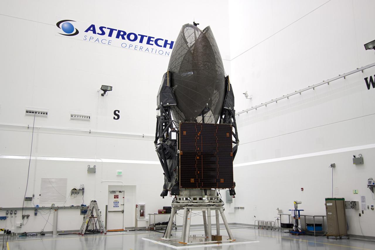 TITUSVILLE, Fla. - Inside the Astrotech payload processing facility in Titusville, Fla. near NASA’s Kennedy Space Center, the Tracking and Data Relay Satellite, TDRS-K, is being checked out prior to being encapsulated in the nose faring.      Launch of the TDRS-K on the Atlas V rocket is planned for January 29, 2013. The TDRS-K spacecraft is part of the next-generation series in the Tracking and Data Relay Satellite System, a constellation of space-based communication satellites providing tracking, telemetry, command and high-bandwidth data return services. For more information, visit http://www.nasa.gov/mission_pages/tdrs/index.html Photo credit: NASA/Jim Grossmann