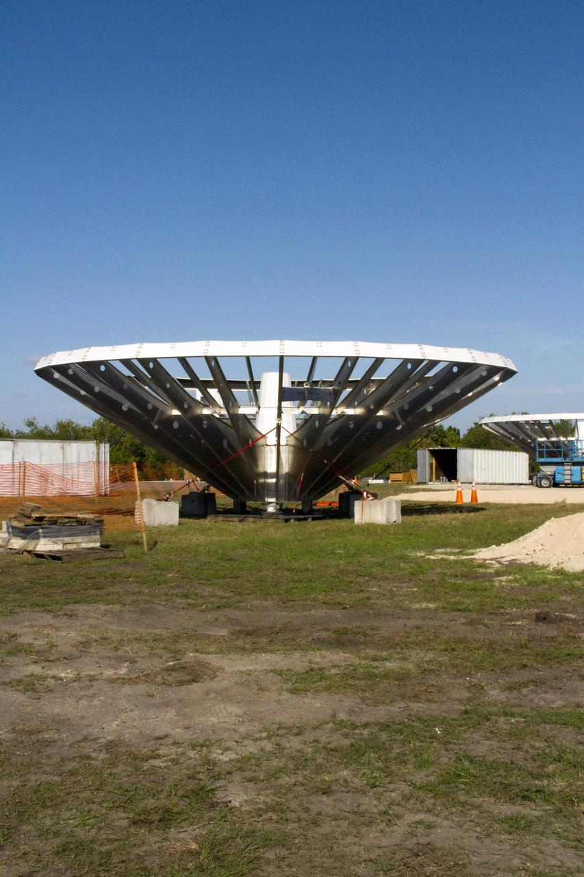 CAPE CANAVERAL, Fla. – At NASA’s Kennedy Space Center in Florida, 40-foot-diameter dish antenna arrays are being constructed as part of the Antenna Test Bed Array for the Ka-Band Objects Observation and Monitoring, or Ka-BOOM system. The antennas will be part of the operations command center facility. The construction site is near the former Vertical Processing Facility, which has been demolished. The Ka-BOOM project is one of the final steps in developing the techniques to build a high power, high resolution radar system capable of becoming a Near Earth Object Early Warning System. While also capable of space communication and radio science experiments, developing radar applications is the primary focus of the arrays. Photo credit: NASA/ Ben Smegelsky