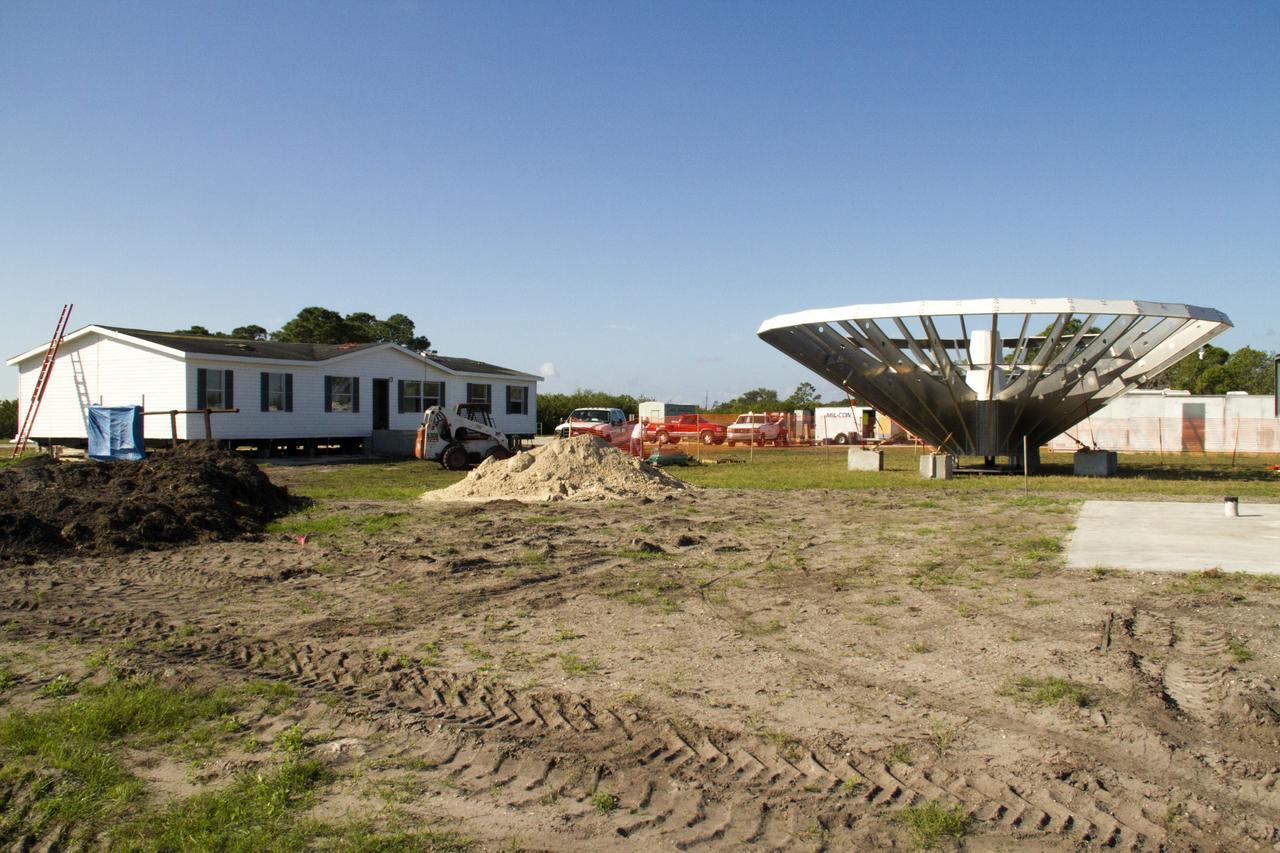 CAPE CANAVERAL, Fla. – At NASA’s Kennedy Space Center in Florida, 40-foot-diameter dish antenna arrays are being constructed as part of the Antenna Test Bed Array for the Ka-Band Objects Observation and Monitoring, or Ka-BOOM system. The antennas will be part of the operations command center facility. The construction site is near the former Vertical Processing Facility, which has been demolished. The Ka-BOOM project is one of the final steps in developing the techniques to build a high power, high resolution radar system capable of becoming a Near Earth Object Early Warning System. While also capable of space communication and radio science experiments, developing radar applications is the primary focus of the arrays. Photo credit: NASA/ Ben Smegelsky