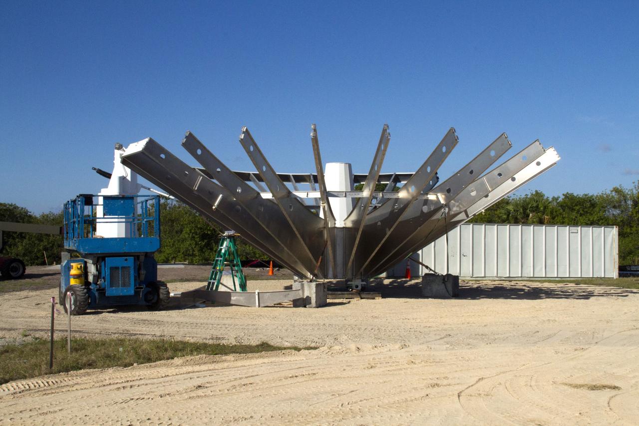 CAPE CANAVERAL, Fla. – At NASA’s Kennedy Space Center in Florida, 40-foot-diameter dish antenna arrays are being constructed as part of the Antenna Test Bed Array for the Ka-Band Objects Observation and Monitoring, or Ka-BOOM system. The antennas will be part of the operations command center facility. The construction site is near the former Vertical Processing Facility, which has been demolished. The Ka-BOOM project is one of the final steps in developing the techniques to build a high power, high resolution radar system capable of becoming a Near Earth Object Early Warning System. While also capable of space communication and radio science experiments, developing radar applications is the primary focus of the arrays. Photo credit: NASA/ Ben Smegelsky