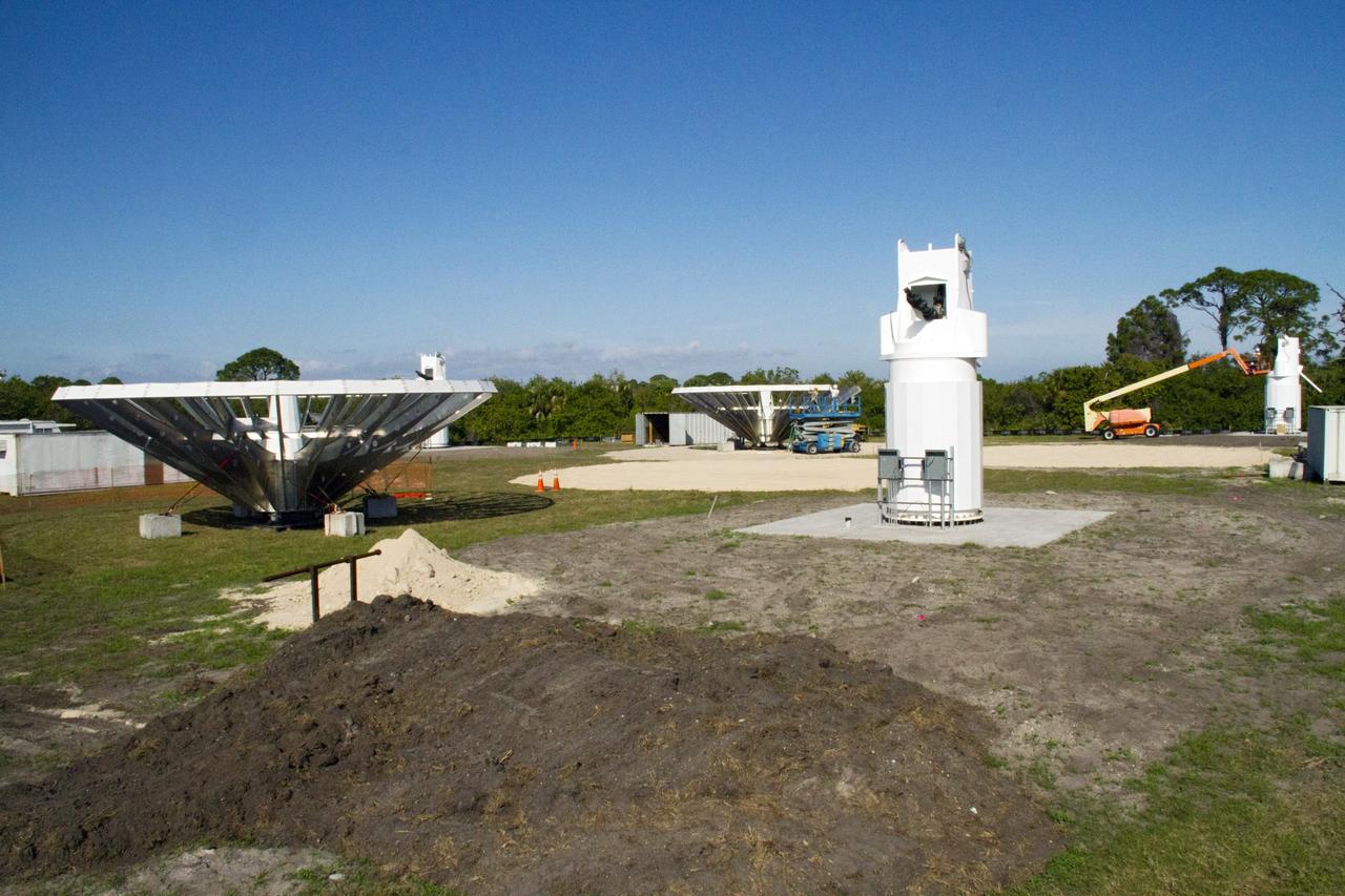 CAPE CANAVERAL, Fla. – At NASA’s Kennedy Space Center in Florida, 40-foot-diameter dish antenna arrays are being constructed as part of the Antenna Test Bed Array for the Ka-Band Objects Observation and Monitoring, or Ka-BOOM system. The antennas will be part of the operations command center facility. The construction site is near the former Vertical Processing Facility, which has been demolished. The Ka-BOOM project is one of the final steps in developing the techniques to build a high power, high resolution radar system capable of becoming a Near Earth Object Early Warning System. While also capable of space communication and radio science experiments, developing radar applications is the primary focus of the arrays. Photo credit: NASA/ Ben Smegelsky