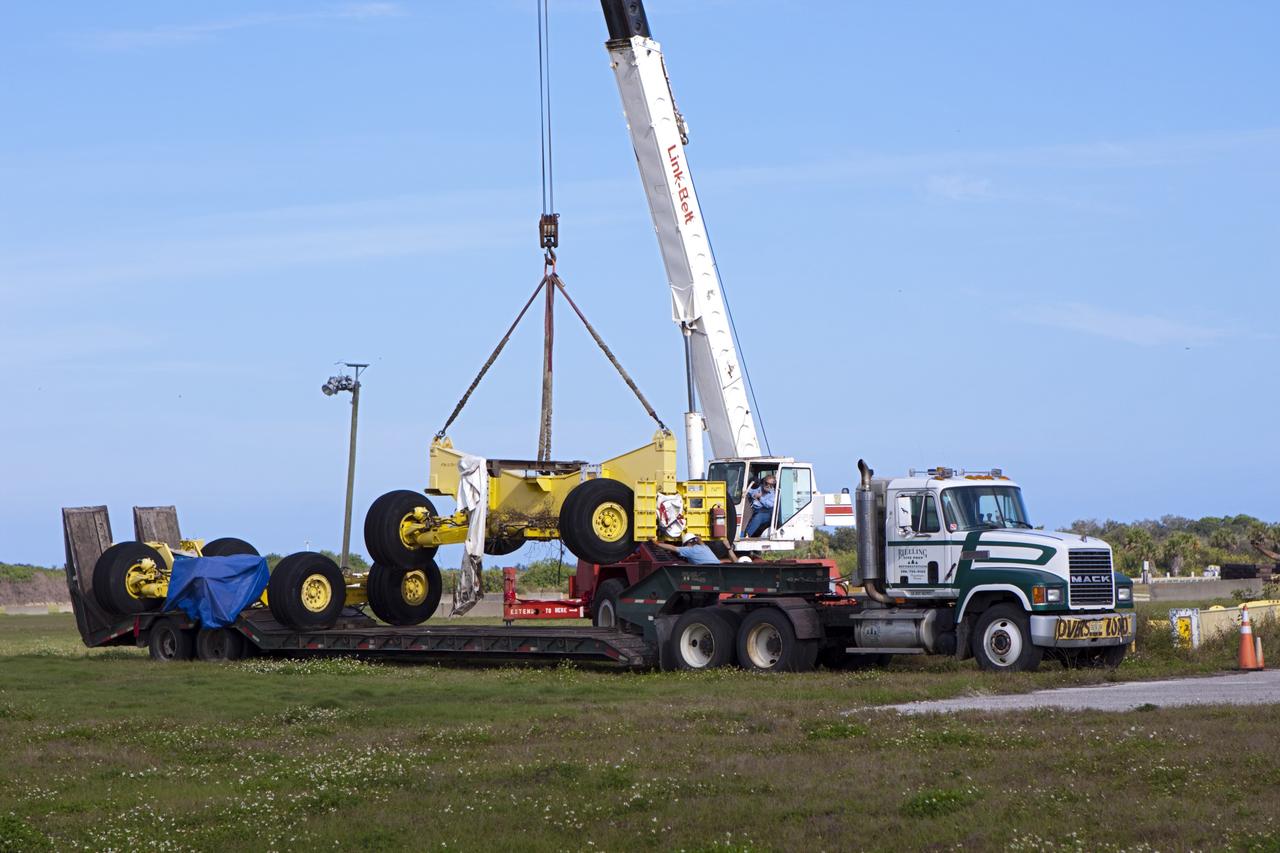 CAPE CANAVERAL, Fla. – At NASA’s Kennedy Space Center in Florida, two space shuttle external fuel tank transporters are being prepared for transfer to the Wings of Dreams Aviation Museum at Keystone Heights Airport between Gainesville and Jacksonville, Fla.      At the Wings of Dreams Aviation Museum a mock-up shuttle external fuel tank will be displayed. During space shuttle launches, the external tanks contained over 500,000 gallons of liquid hydrogen and liquid oxygen propellant for the shuttle orbiters' three main engines. The effort is part of Transition and Retirement of the space shuttle. For more information, visit http://www.nasa.gov/transition Photo credit: NASA/ Jim Grossmann