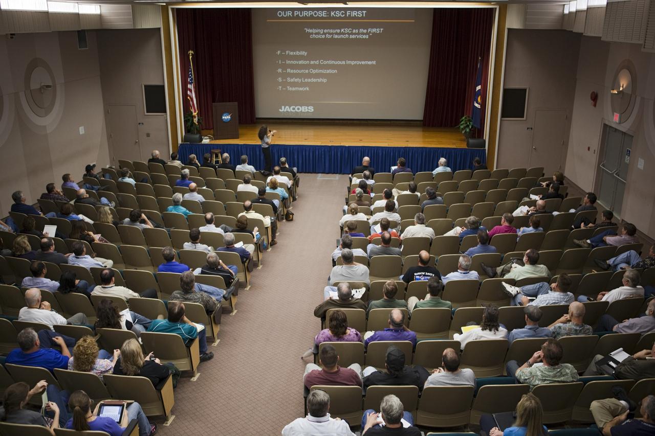 CAPE CANAVERAL, Fla. - At NASA's Kennedy Space Center in Florida, Jacobs Technology Deputy General Manager Lorna Kenna speaks at a town hall meeting providing attendees an opportunity to learn about the Test and Operations Support Contract, or TOSC, hiring process and to introduce the organization's management team.      NASA recently awarded its TOSC contract to Jacobs Technology Inc. of Tullahoma, Tenn. Jacobs will provide overall management and implementation of ground systems capabilities, flight hardware processing and launch operations at Kennedy. These tasks will support the International Space Station, Ground Systems Development and Operations, and the Space Launch System, Orion Multi-Purpose Crew Vehicle and Launch Services programs. For more information, visit http://www.nasa.gov/centers/kennedy/news/tosc_awarded.html Photo credit: NASA/Dimitri Gerondidakis