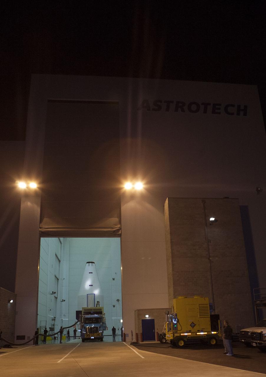 CAPE CANAVERAL, Fla. – NASA's Tracking and Data Relay Satellite, TDRS-K, is enclosed in its payload fairing and prepared for its move atop a transporter from the Astrotech payload processing facility in Titusville, Fla., to its launch site. TDRS-K will lift off atop a United Launch Alliance Atlas V rocket from Cape Canaveral Air Force Station's Space Launch Complex 41, near NASA's Kennedy Space Center. The TDRS-K spacecraft is part of the next-generation series in the Tracking and Data Relay Satellite System, a constellation of space-based communication satellites providing tracking, telemetry, command and high-bandwidth data return services. For more information, go to http://www.nasa.gov/tdrs Photo credit: NASA/Glenn Benson