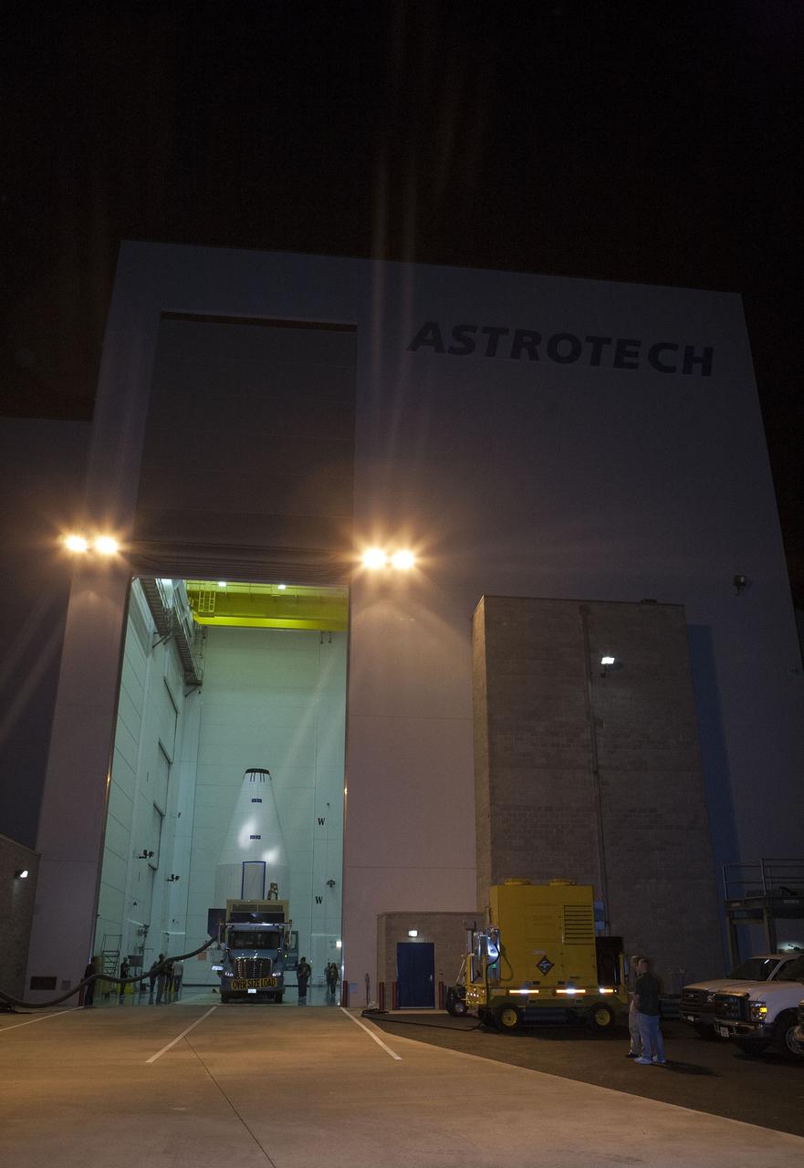 CAPE CANAVERAL, Fla. – NASA's Tracking and Data Relay Satellite, TDRS-K, is enclosed in its payload fairing and prepared for its move atop a transporter from the Astrotech payload processing facility in Titusville, Fla., to its launch site. TDRS-K will lift off atop a United Launch Alliance Atlas V rocket from Cape Canaveral Air Force Station's Space Launch Complex 41, near NASA's Kennedy Space Center. The TDRS-K spacecraft is part of the next-generation series in the Tracking and Data Relay Satellite System, a constellation of space-based communication satellites providing tracking, telemetry, command and high-bandwidth data return services. For more information, go to http://www.nasa.gov/tdrs Photo credit: NASA/Glenn Benson