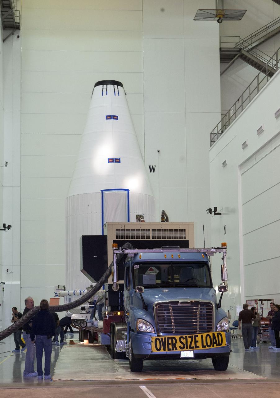 CAPE CANAVERAL, Fla. – NASA's Tracking and Data Relay Satellite, TDRS-K, is enclosed in its payload fairing and prepared for its move atop a transporter from the Astrotech payload processing facility in Titusville, Fla., to its launch site. TDRS-K will lift off atop a United Launch Alliance Atlas V rocket from Cape Canaveral Air Force Station's Space Launch Complex 41, near NASA's Kennedy Space Center. The TDRS-K spacecraft is part of the next-generation series in the Tracking and Data Relay Satellite System, a constellation of space-based communication satellites providing tracking, telemetry, command and high-bandwidth data return services. For more information, go to http://www.nasa.gov/tdrs Photo credit: NASA/Glenn Benson