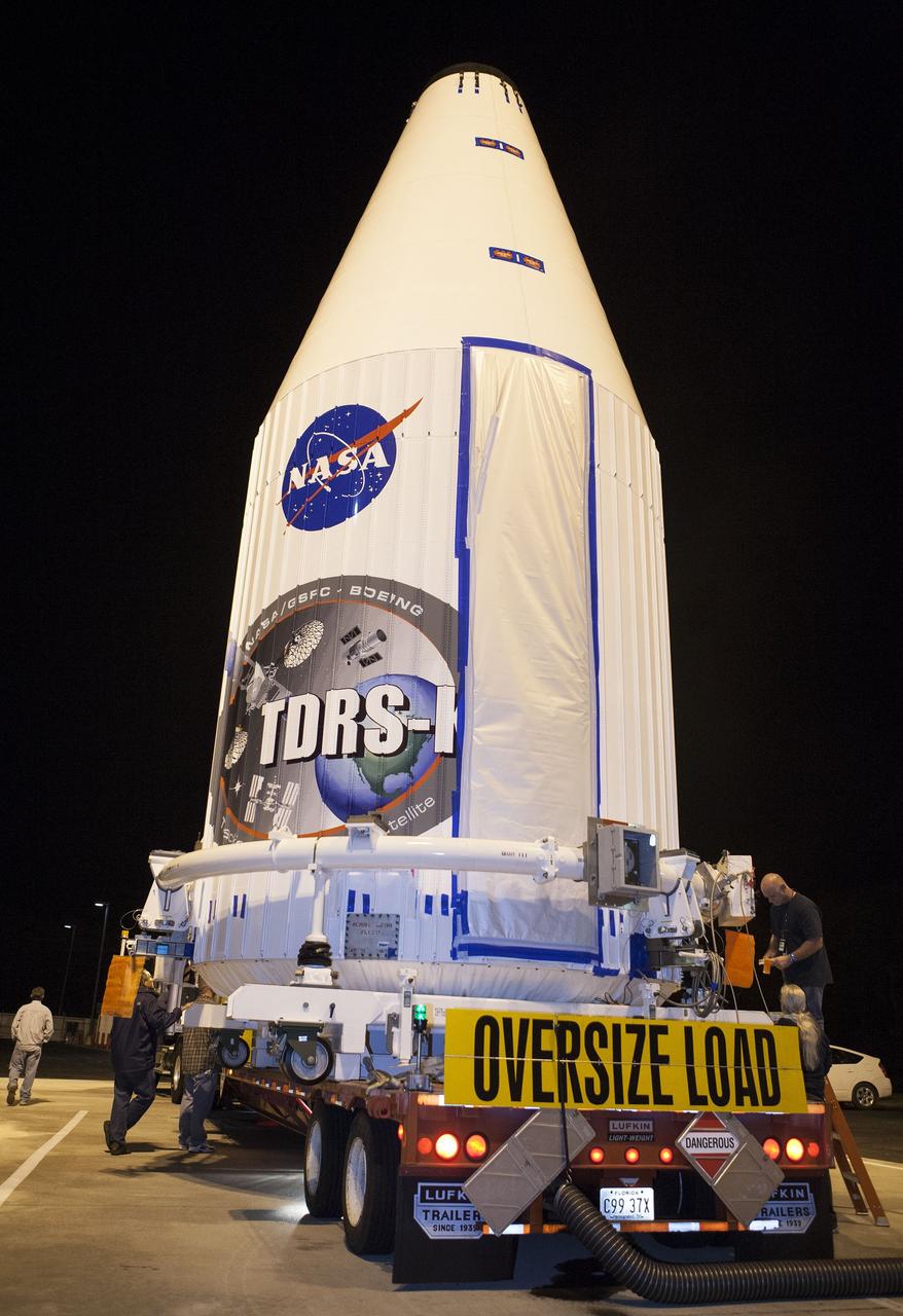 CAPE CANAVERAL, Fla. –NASA's Tracking and Data Relay Satellite, TDRS-K, enclosed in its payload fairing, is en route to its launch site from the Astrotech payload processing facility in Titusville, Fla. TDRS-K will lift off atop a United Launch Alliance Atlas V rocket from Cape Canaveral Air Force Station's Space Launch Complex 41, near NASA's Kennedy Space Center. The TDRS-K spacecraft is part of the next-generation series in the Tracking and Data Relay Satellite System, a constellation of space-based communication satellites providing tracking, telemetry, command and high-bandwidth data return services. For more information, go to http://www.nasa.gov/tdrs Photo credit: NASA/Glenn Benson
