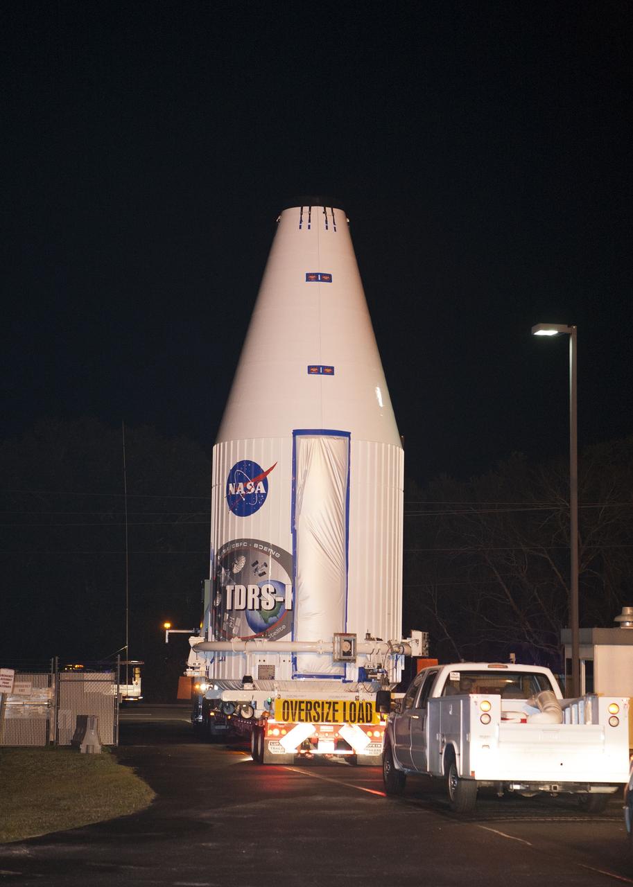 CAPE CANAVERAL, Fla. –NASA's Tracking and Data Relay Satellite, TDRS-K, enclosed in its payload fairing, enters a NASA Kennedy Space Center gate as it travels from the Astrotech payload processing facility in Titusville, Fla., to its launch site. TDRS-K will lift off atop a United Launch Alliance Atlas V rocket from Cape Canaveral Air Force Station's Space Launch Complex 41. The TDRS-K spacecraft is part of the next-generation series in the Tracking and Data Relay Satellite System, a constellation of space-based communication satellites providing tracking, telemetry, command and high-bandwidth data return services. For more information, go to http://www.nasa.gov/tdrs Photo credit: NASA/Glenn Benson