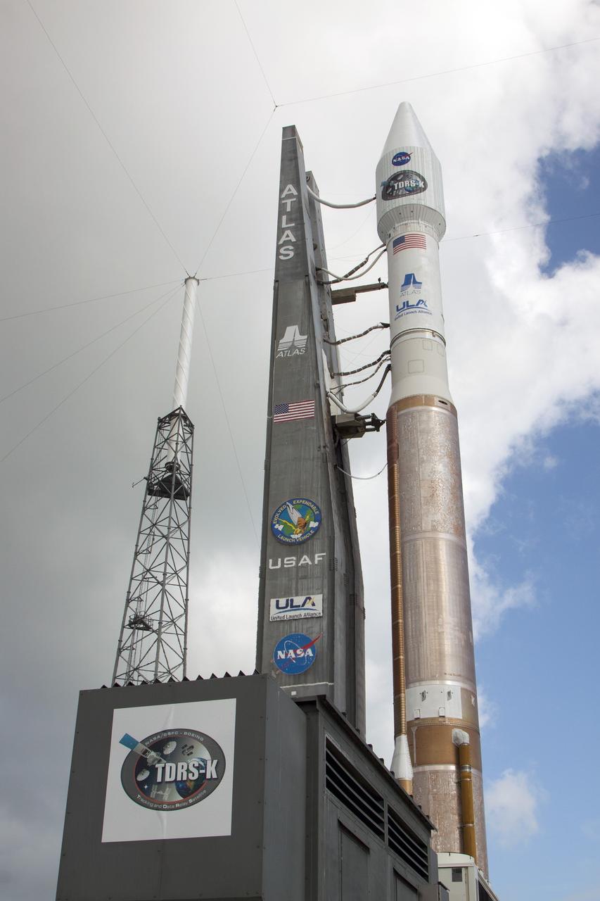 CAPE CANAVERAL, Fla. -- At Cape Canaveral Air Force Station's Space Launch Complex 41, the United Launch Alliance Atlas V rocket set to carry NASA's Tracking and Data Relay Satellite, TDRS-K, arrives at the launch pad after leaving the Vertical Integration Facility.      Liftoff for the TDRS-K is planned for Jan. 30, 2013. The TDRS-K spacecraft is part of the next-generation series in the Tracking and Data Relay Satellite System, a constellation of space-based communication satellites providing tracking, telemetry, command and high-bandwidth data return services. For more information, visit http://www.nasa.gov/mission_pages/tdrs/index.html Photo credit: NASA/Kim Shiflett