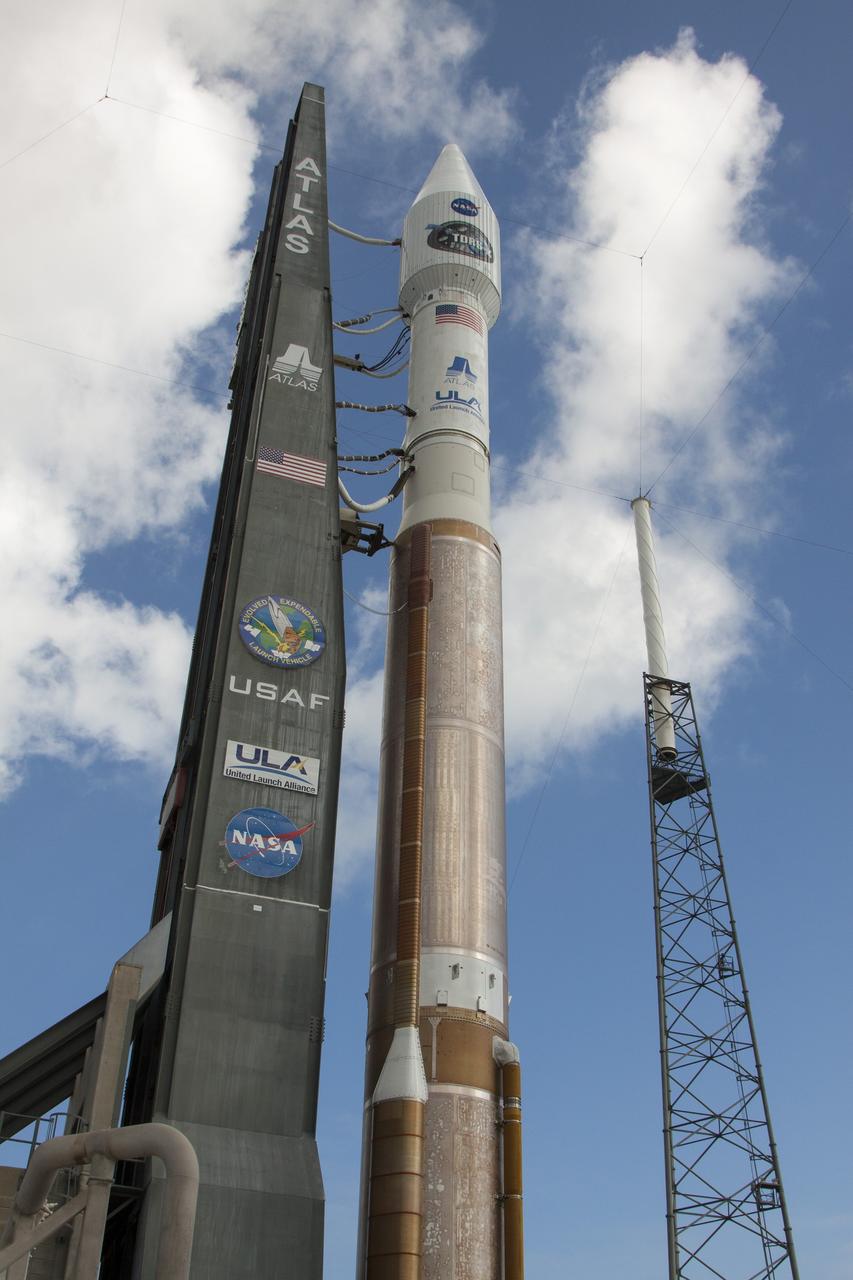 CAPE CANAVERAL, Fla. -- At Cape Canaveral Air Force Station's Space Launch Complex 41, the United Launch Alliance Atlas V rocket set to carry NASA's Tracking and Data Relay Satellite, TDRS-K, arrives at the launch pad after leaving the Vertical Integration Facility. Liftoff for the TDRS-K is planned for Jan. 30, 2013. The TDRS-K spacecraft is part of the next-generation series in the Tracking and Data Relay Satellite System, a constellation of space-based communication satellites providing tracking, telemetry, command and high-bandwidth data return services. For more information, visit http://www.nasa.gov/mission_pages/tdrs/index.html Photo credit: NASA/Kim Shiflett