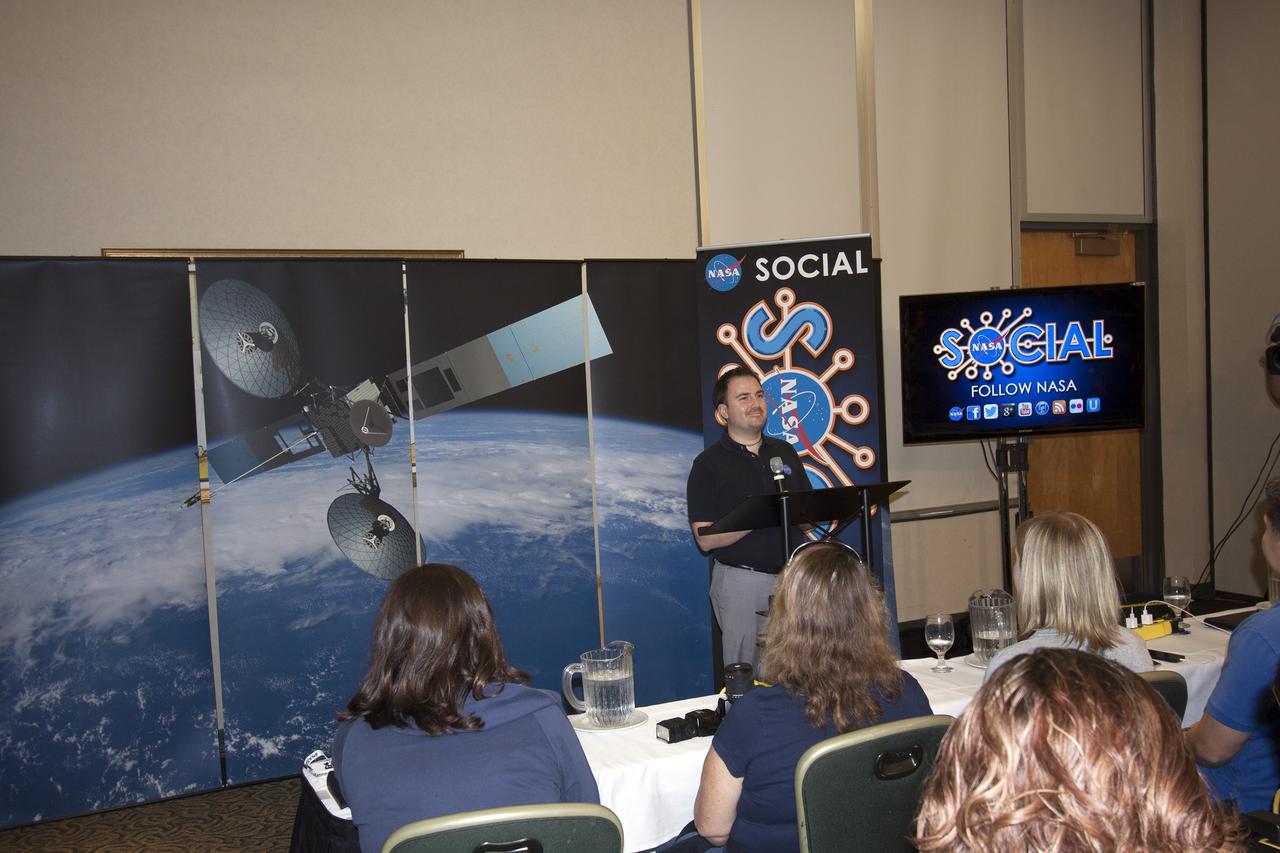 CAPE CANAVERAL, Fla. -- At NASA's Kennedy Space Center in Florida, Jason Townsend of NASA's Social Media Team welcomes agency social media followers to the first day of activities of a NASA Social revolving around NASA's Tracking and Data Relay Satellite-K mission. NASA Socials are in-person meetings for people who engage with the agency through Twitter, Facebook, Google+ and other social networks. The satellite, known as TDRS-K, is set to launch at 8:48 p.m. EST on Jan. 30 aboard a United Launch Alliance Atlas V rocket from Space Launch Complex 41 on nearby Cape Canaveral Air Force Station. About 50 followers were selected to participate in the TDRS-K prelaunch and launch activities and share them with their own fan base. The TDRS-K spacecraft is part of the next-generation series in the Tracking and Data Relay Satellite System, a constellation of space-based communication satellites providing tracking, telemetry, command and high-bandwidth data return services. For more information, visit http://www.nasa.gov/mission_pages/tdrs/index.html. Photo credit: NASA/Jim Grossmann