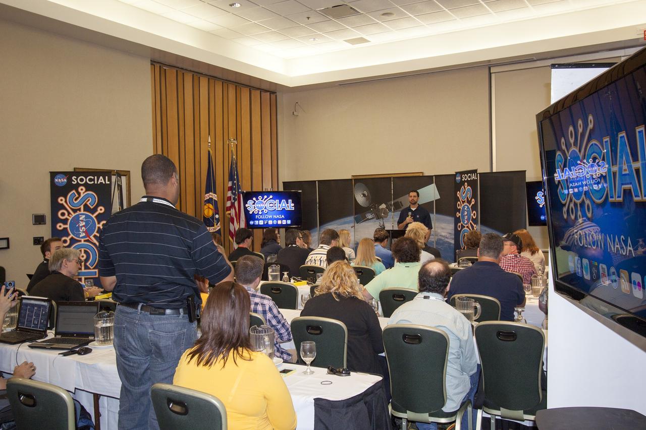 CAPE CANAVERAL, Fla. -- At NASA's Kennedy Space Center in Florida, Jeremy Parsons, technical manager for operations of NASA's Ground Systems Development and Operations Program, takes a question from an agency social media follower participating in the first day of activities of a NASA Social revolving around NASA's Tracking and Data Relay Satellite-K mission. NASA Socials are in-person meetings for people who engage with the agency through Twitter, Facebook, Google+ and other social networks. The satellite, known as TDRS-K, is set to launch at 8:48 p.m. EST on Jan. 30 aboard a United Launch Alliance Atlas V rocket from Space Launch Complex 41 on nearby Cape Canaveral Air Force Station. About 50 followers were selected to participate in the TDRS-K prelaunch and launch activities and share them with their own fan base. The TDRS-K spacecraft is part of the next-generation series in the Tracking and Data Relay Satellite System, a constellation of space-based communication satellites providing tracking, telemetry, command and high-bandwidth data return services. For more information, visit http://www.nasa.gov/mission_pages/tdrs/index.html. Photo credit: NASA/Jim Grossmann