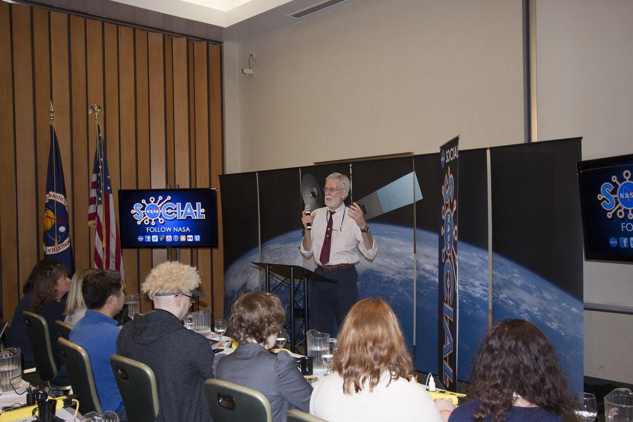 CAPE CANAVERAL, Fla. -- At NASA's Kennedy Space Center in Florida, Dr. Compton Tucker, senior scientist from NASA's Goddard Space Flight Center, addresses agency social media followers on the first day of activities of a NASA Social revolving around NASA's Tracking and Data Relay Satellite-K mission. NASA Socials are in-person meetings for people who engage with the agency through Twitter, Facebook, Google+ and other social networks. The satellite, known as TDRS-K, is set to launch at 8:48 p.m. EST on Jan. 30 aboard a United Launch Alliance Atlas V rocket from Space Launch Complex 41 on nearby Cape Canaveral Air Force Station. About 50 followers were selected to participate in the TDRS-K prelaunch and launch activities and share them with their own fan base. The TDRS-K spacecraft is part of the next-generation series in the Tracking and Data Relay Satellite System, a constellation of space-based communication satellites providing tracking, telemetry, command and high-bandwidth data return services. For more information, visit http://www.nasa.gov/mission_pages/tdrs/index.html. Photo credit: NASA/Jim Grossmann