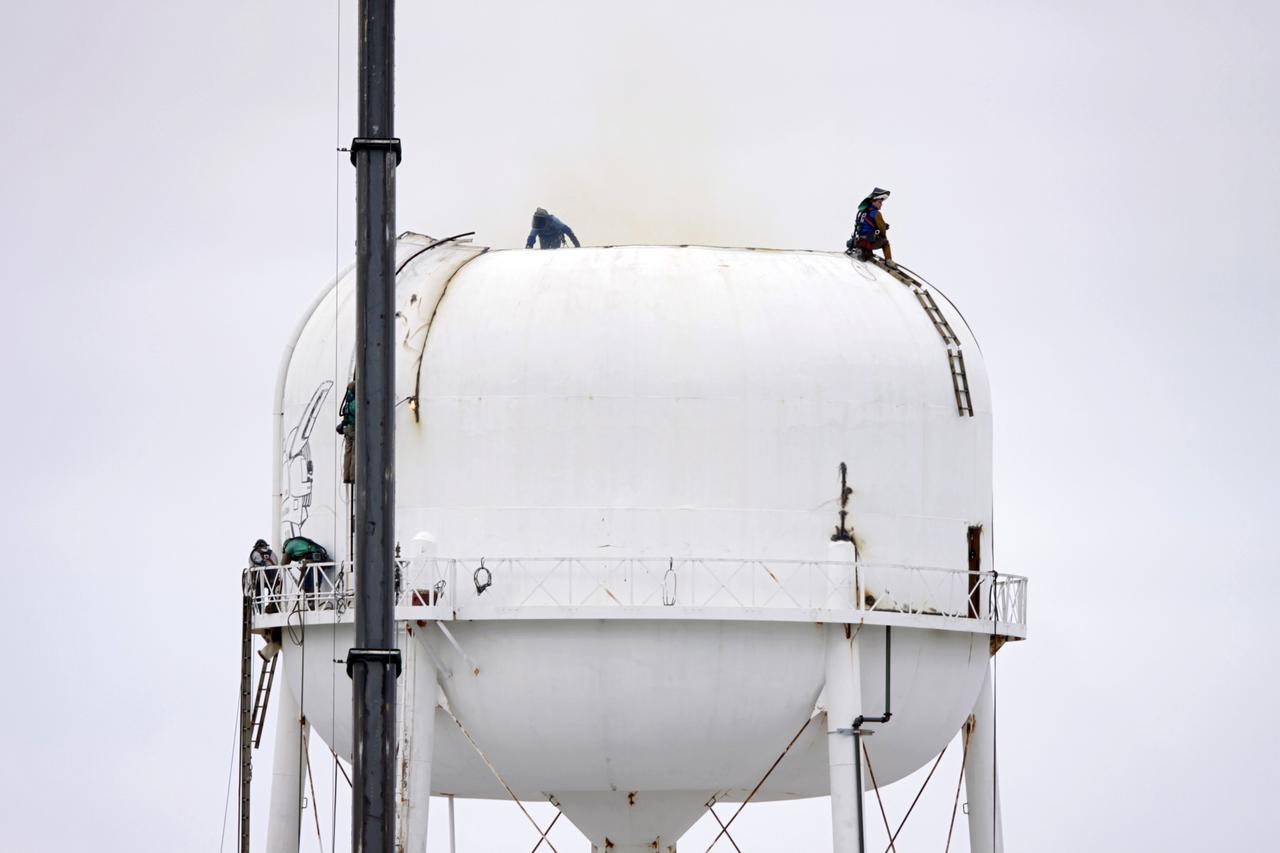 CAPE CANAVERAL, Fla. – Workers use a cutting torch to dismantle a water tower in the Launch Complex 39 area at NASA’s Kennedy Space Center in Florida. The effort is part of on-going efforts to upgrade and revitalize Kennedy's water and sewer systems to increase their reliability, sustainability and capabilities into the 21st century for current and future users. For more information, visit: http://kscpartnerships.ksc.nasa.gov/masterPlan/spaceportConcept.htm Photo credit: NASA/Tim Jacobs