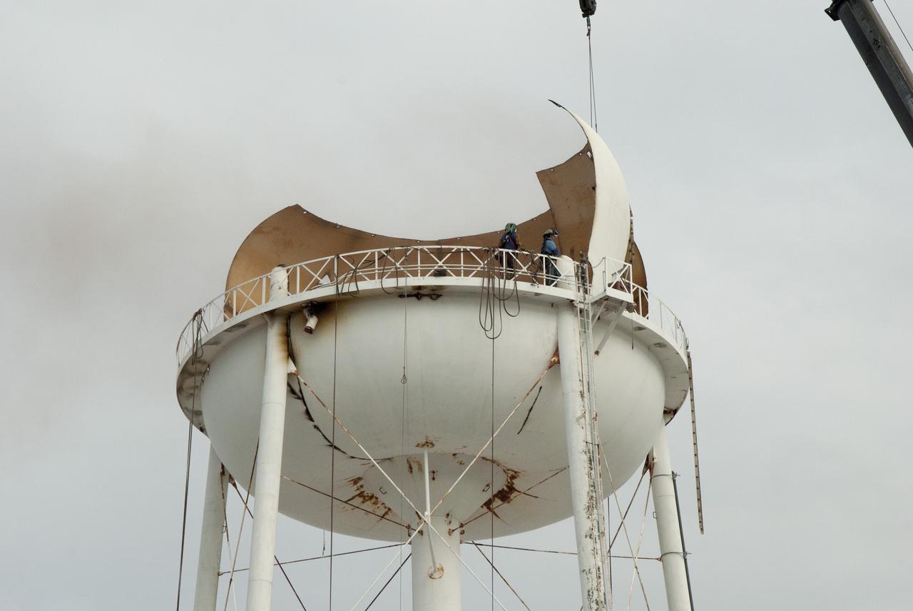 CAPE CANAVERAL, Fla. – At NASA’s Kennedy Space Center in Florida, work is underway to dismantle a water tower in the Launch Complex 39 area near the Vehicle Assembly Building. The effort is part of on-going efforts to upgrade and revitalize Kennedy's water and sewer systems to increase their reliability, sustainability and capabilities into the 21st century for current and future users. For more information, visit: http://kscpartnerships.ksc.nasa.gov/masterPlan/spaceportConcept.htm Photo credit: NASA/Jim Grossmann