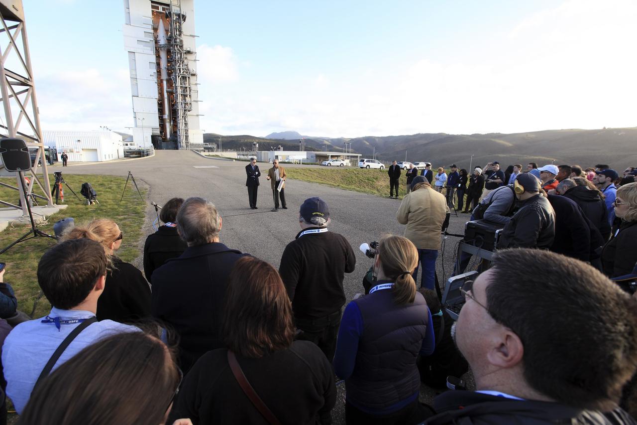 VANDENBERG AFB, Calif. -- At Space Launch Complex 3E at Vandenberg Air Force Base, Calif., Kennedy Space Center Director Bob Cabana, left, and NASA Administrator Charles Bolden discuss the Landsat Data Continuity Mission, or LDCM, satellite mission with NASA social media followers.      The Landsat Data Continuity Mission LDCM is the future of Landsat satellites. It will continue to obtain valuable data and imagery to be used in agriculture, education, business, science, and government. The Landsat Program provides repetitive acquisition of high resolution multispectral data of the Earth's surface on a global basis. The data from the Landsat spacecraft constitute the longest record of the Earth's continental surfaces as seen from space. It is a record unmatched in quality, detail, coverage, and value. Liftoff is planned for Feb. 11, 2013 aboard a United Launch Alliance Atlas V rocket. For more information, visit: http://www.nasa.gov/mission_pages/landsat/main/index.html Photo credit: NASA/Kim Shiflett