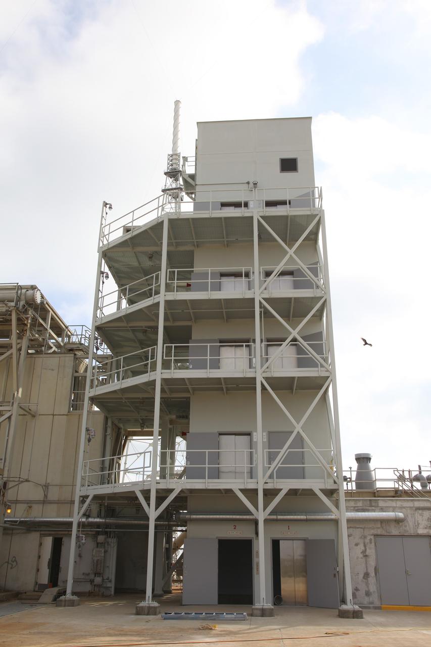 CAPE CANAVERAL, Fla. -- At NASA’s Kennedy Space Center in Florida, the Launch Pad 39B elevator has been upgraded and painted. Also, various fluid interface connections have been installed on the pad. New system connections include chilled water supply-and-return and conditioned air that will be used to provide the mobile launcher with the necessary commodities during launch operations.    The Ground Systems Development and Operations Program office at Kennedy is overseeing upgrades and modifications to Pad B to support the launch of NASA’s Space Launch System heavy-lift rocket, which is under design, and new Orion spacecraft. The pads supported space shuttle launches for 30 years.  Photo credit: NASA/Frankie Martin