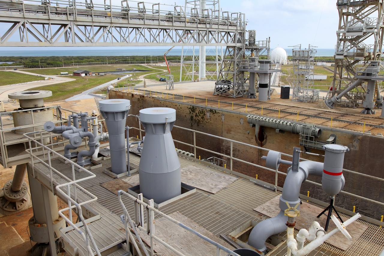 CAPE CANAVERAL, Fla. -- At NASA’s Kennedy Space Center in Florida, various fluid interface connections have been installed at Launch Pad 39B. New system connections include chilled water supply-and-return and conditioned air that will be used to provide the mobile launcher with the necessary commodities during launch operations.    The Ground Systems Development and Operations Program office at Kennedy is overseeing upgrades and modifications to Pad B to support the launch of NASA’s Space Launch System heavy-lift rocket, which is under design, and new Orion spacecraft. The pads supported space shuttle launches for 30 years.  Photo credit: NASA/Frankie Martin