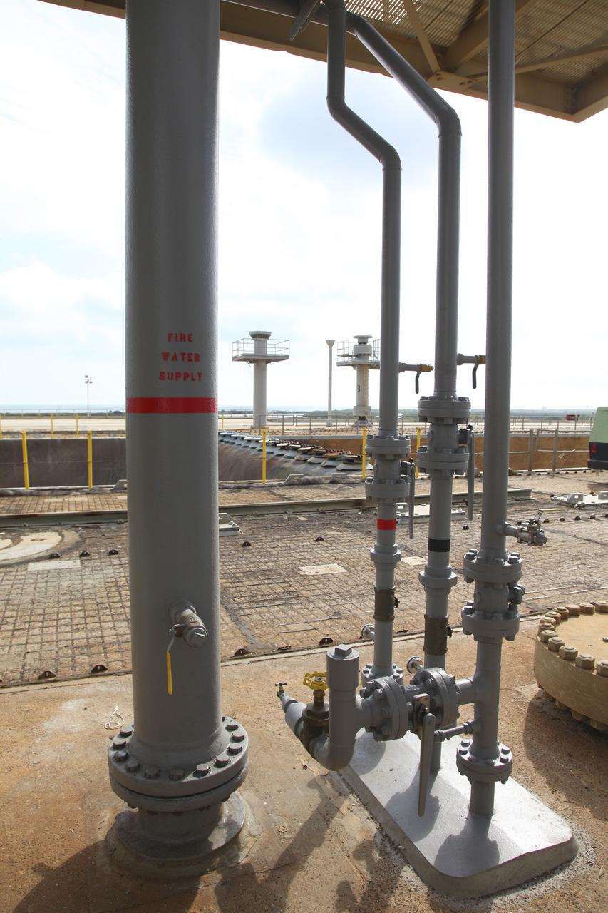 CAPE CANAVERAL, Fla. -- At NASA’s Kennedy Space Center in Florida, various fluid interface connections have been installed at Launch Pad 39B. New system connections include chilled water supply-and-return and conditioned air that will be used to provide the mobile launcher with the necessary commodities during launch operations.    The Ground Systems Development and Operations Program office at Kennedy is overseeing upgrades and modifications to Pad B to support the launch of NASA’s Space Launch System heavy-lift rocket, which is under design, and new Orion spacecraft. The pads supported space shuttle launches for 30 years.  Photo credit: NASA/Frankie Martin