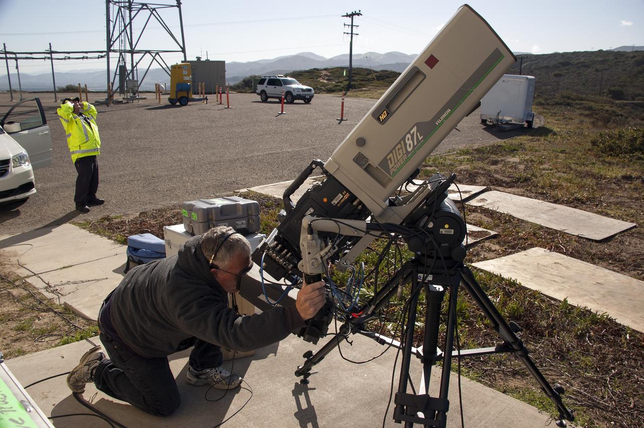 VANDENBERG AFB, Calif. – A NASA TV technician records the launch of a United Launch Alliance Atlas V rocket carrying the Landsat Data Continuity Mission spacecraft from Vandenberg Air Force Base in California. Photo credit: NASA/Ben Smegelsky