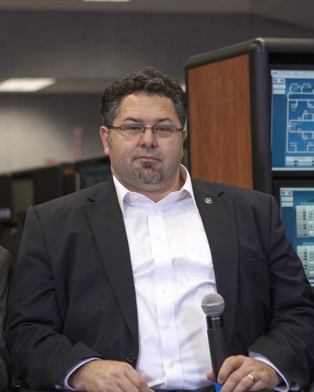 CAPE CANAVERAL, Fla. – Todd May, Space Launch System program manager, takes part in a briefing inside the Young-Crippen Firing Room at NASA's Kennedy Space Center in Florida. NASA officials discussed the goals and expectations for a September 2014 flight test called Exploration Flight Test-1 or EFT-1 as part of the agency's goal of launching astronauts into deep space. Photo credit: NASA/Jim Grossmann