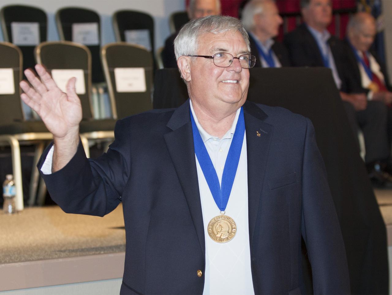 CAPE CANAVERAL, Fla. – U.S. Astronaut Hall of Fame member Dan Brandenstein is introduced at NASA’s Kennedy Space Center Visitor Complex in Florida, prior to the ceremony in which Bonnie Dunbar, Curt Brown and Eileen Collins will be inducted into the group of space pioneers.      This induction is the twelfth group of space shuttle astronauts named to the AHOF, and the first time two women are inducted at the same time. The year’s inductees were selected by a committee of current Hall of Fame astronauts, former NASA officials, historians and journalists. The selection process is administered by the Astronaut Scholarship Foundation. For more on the U.S. Astronaut Hall of Fame, go to http://www.kennedyspacecenter.com/astronaut-hall-of-fame.aspx For more on the Astronaut Scholarship Foundation, go to http://astronautscholarship.org/ Photo credit: NASA/ Kim Shiflett