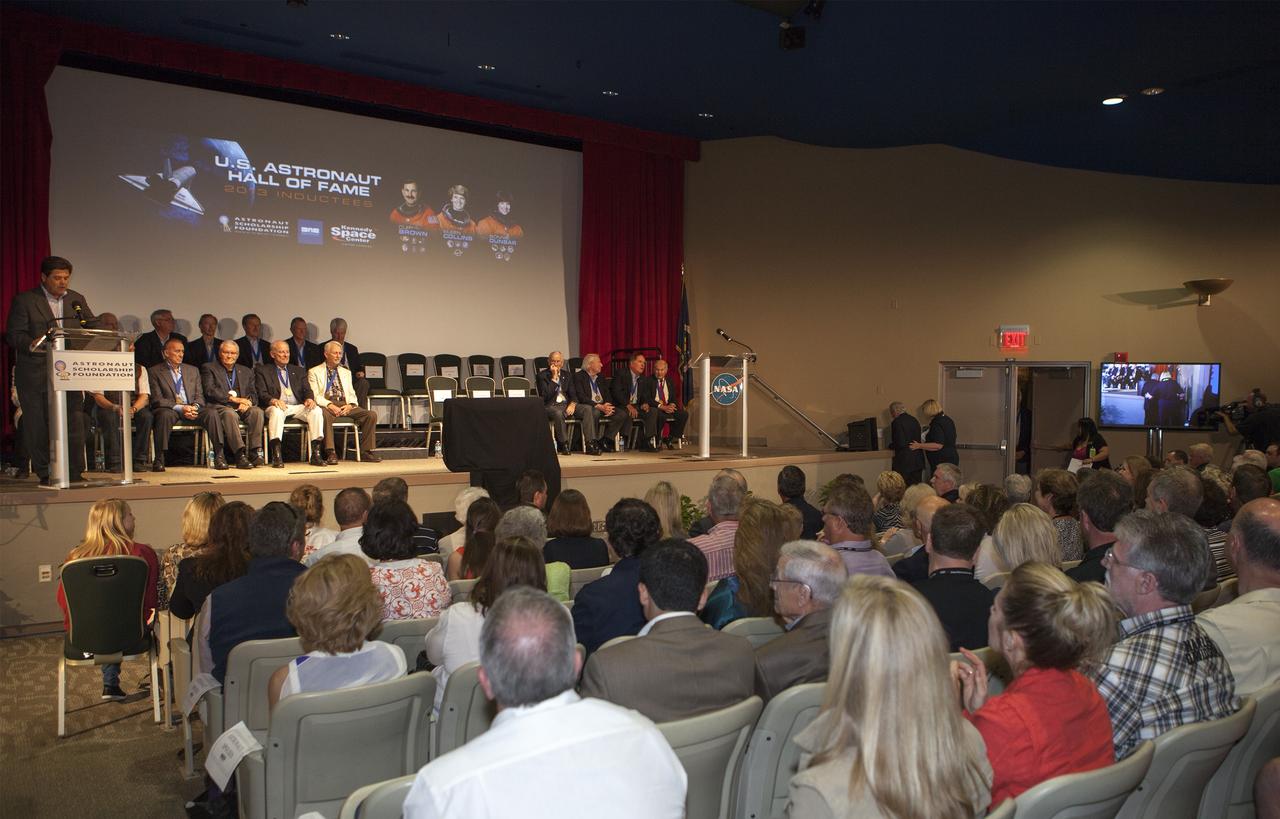 CAPE CANAVERAL, Fla. – At NASA’s Kennedy Space Center Visitor Complex in Florida, Master of Ceremonies John Zarrella, CNN's principal correspondent for coverage of NASA’s space programs, introduces Hall of Fame astronauts who gathered to honor 2013 inductees Curt Brown, Eileen Collins and Bonnie Dunbar.      This induction is the twelfth group of space shuttle astronauts named to the AHOF, and the first time two women are inducted at the same time. The year’s inductees were selected by a committee of current Hall of Fame astronauts, former NASA officials, historians and journalists. The selection process is administered by the Astronaut Scholarship Foundation. For more on the U.S. Astronaut Hall of Fame, go to http://www.kennedyspacecenter.com/astronaut-hall-of-fame.aspx For more on the Astronaut Scholarship Foundation, go to http://astronautscholarship.org/ Photo credit: NASA/ Kim Shiflett