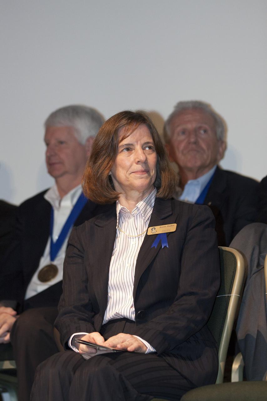 CAPE CANAVERAL, Fla. – At NASA’s Kennedy Space Center Visitor Complex in Florida, shuttle astronaut Bonnie Dunbar listens as she is being introduced for induction into the U.S. Astronaut Hall of Fame AHOF. Dunbar received NASA’s Outstanding Leadership Award in 1993 and NASA’s Exceptional Service Medal in 1998 and 1991. During her career with NASA, she served as a mission specialist and a payload commander. Dunbar logged 1,208 hours in space, and her spaceflights include STS 61-A, STS-32, STS-50, STS-71 and STS-89. Shuttle astronauts Curt Brown and Eileen Collins also were inducted into the AHOF.      This induction is the twelfth group of space shuttle astronauts named to the AHOF, and the first time two women are inducted at the same time. The year’s inductees were selected by a committee of current Hall of Fame astronauts, former NASA officials, historians and journalists. The selection process is administered by the Astronaut Scholarship Foundation. For more on the U.S. Astronaut Hall of Fame, go to http://www.kennedyspacecenter.com/astronaut-hall-of-fame.aspx For more on the Astronaut Scholarship Foundation, go to http://astronautscholarship.org/ Photo credit: NASA/ Kim Shiflett