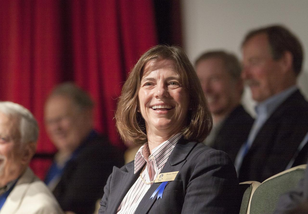 CAPE CANAVERAL, Fla. – At NASA’s Kennedy Space Center Visitor Complex in Florida, shuttle astronaut Bonnie Dunbar listens as she is being introduced for induction into the U.S. Astronaut Hall of Fame AHOF. Dunbar received NASA’s Outstanding Leadership Award in 1993 and NASA’s Exceptional Service Medal in 1998 and 1991. During her career with NASA, she served as a mission specialist and a payload commander. Dunbar logged 1,208 hours in space, and her spaceflights include STS 61-A, STS-32, STS-50, STS-71 and STS-89. Shuttle astronauts Curt Brown and Eileen Collins also were inducted into the AHOF.      This induction is the twelfth group of space shuttle astronauts named to the AHOF, and the first time two women are inducted at the same time. The year’s inductees were selected by a committee of current Hall of Fame astronauts, former NASA officials, historians and journalists. The selection process is administered by the Astronaut Scholarship Foundation. For more on the U.S. Astronaut Hall of Fame, go to http://www.kennedyspacecenter.com/astronaut-hall-of-fame.aspx For more on the Astronaut Scholarship Foundation, go to http://astronautscholarship.org/ Photo credit: NASA/ Kim Shiflett