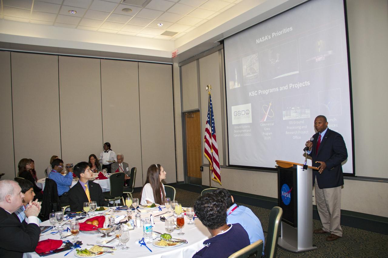 CAPE CANAVERAL, Fla. – At the Kennedy Space Center Visitor Complex in Florida, Kelvin Manning, the center's associate deputy director, addresses students, teachers, parents and VIPs during the 2013 DuPont Challenge Science Essay Competition awards ceremony. The challenge, now in its 27th year, reaches out to students from grades seven through 12 from all 50 states and Canada. More than 200,000 students entered the competition. The DuPont Challenge aims to inspire students to excel and achieve in scientific writing and pursue careers in science, technology, engineering and mathematics STEM. The challenge honors space shuttle Challenger's STS-51L crew members who gave their lives while furthering the cause of exploration and discovery. For more information on the challenge, go to http://thechallenge.dupont.com/sponsors/nasa.php.