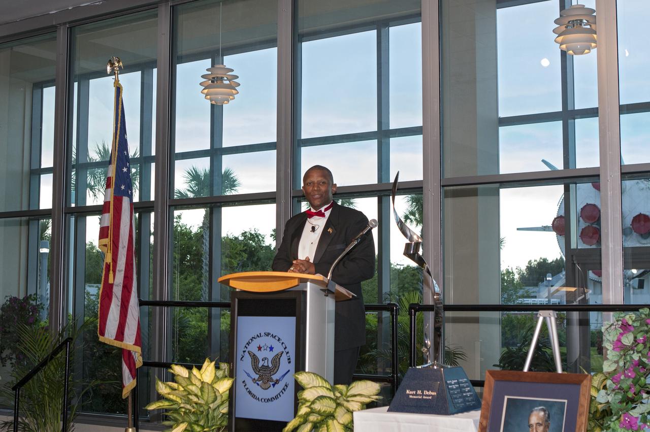 CAPE CANAVERAL, Fla. – At NASA’s Kennedy Space Center Visitor Complex in Florida, the center's associate director, Kelvin Manning, served as emcee for the Dr. Kurt H. Debus Award gala in which the prestigious honor was presented to Kennedy's director, Bob Cabana.      A former U.S. Marine Corps aviator and NASA astronaut, Cabana was honored at the gala Debus Award Dinner. Named for the spaceport’s first director, the Debus Award was created to recognize significant achievements and contributions made in Florida to American aerospace efforts. The Debus Award was created by the space club's Florida committee to recognize significant achievements and contributions made in Florida to American aerospace efforts. Photo credit: NASA/Jim Grossmann
